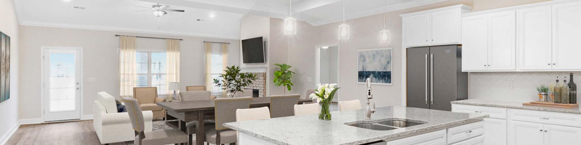 Spacious open-concept kitchen dining living area at Huntington Park in Priceville Alabama with white island hardwood floors