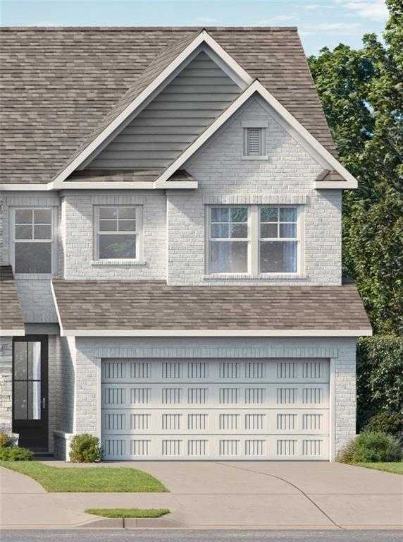 Two-story white brick Cary A home with 2-car garage and driveway in Lake Shore, Winder, Georgia - Davidson Homes