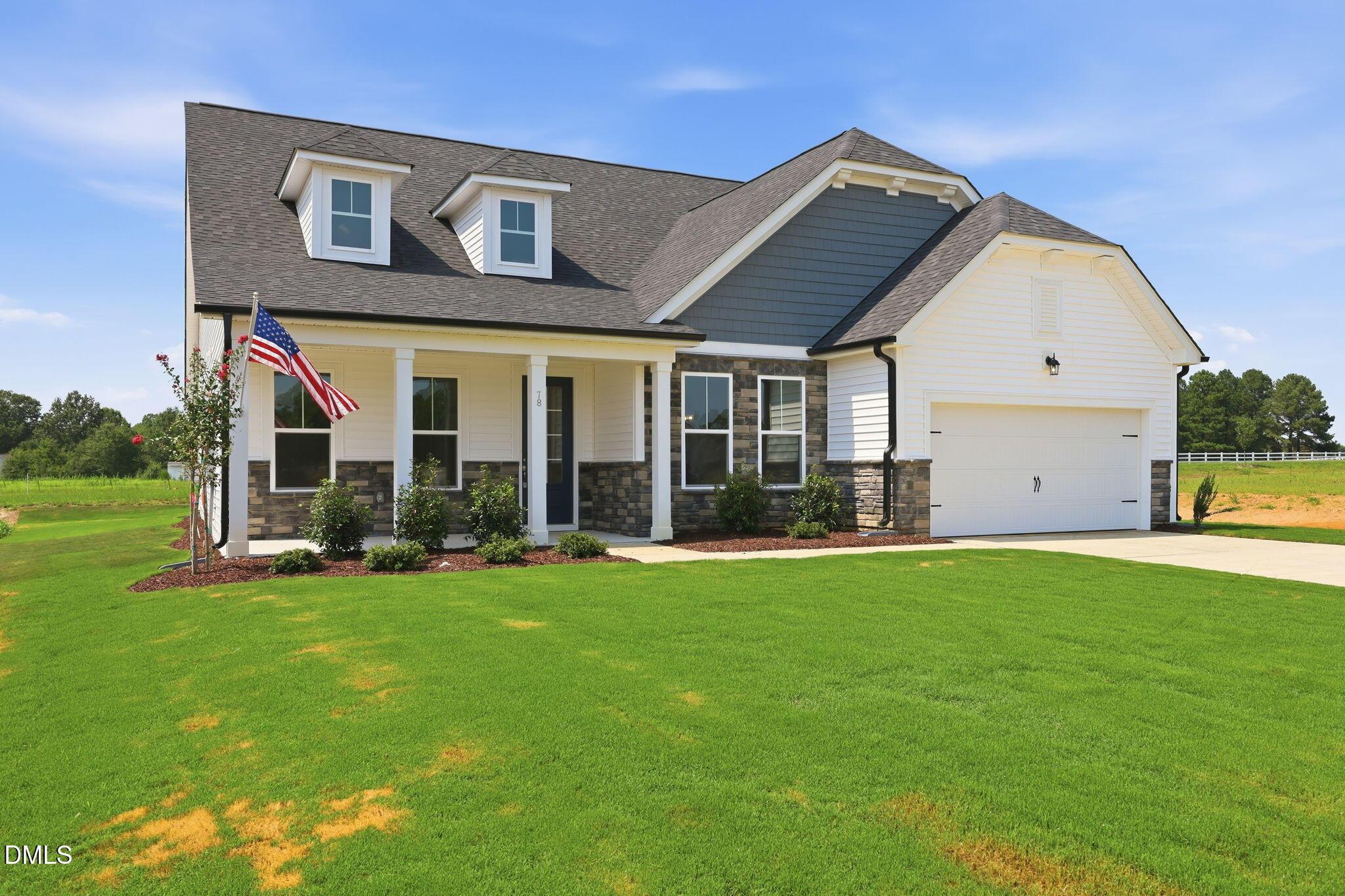 The Magnolia B floor plan by Davidson Homes in Retreat at North Main, Lillington, NC, features this 1-story, 2-car home.