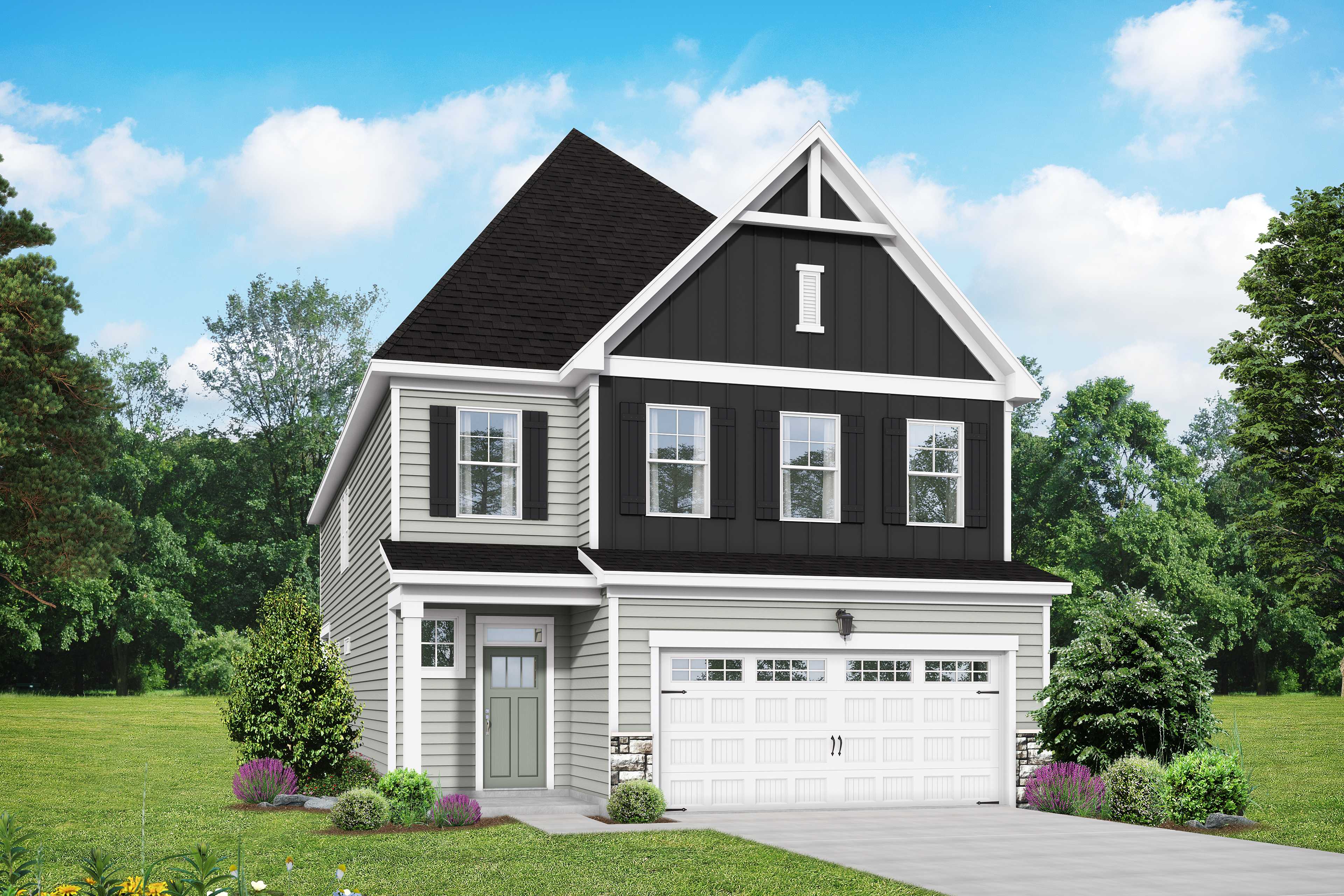 Modern two-story Preston home exterior by Davidson Homes: gray siding, black gabled roof, two-car garage, lush landscaping in Wendell NC