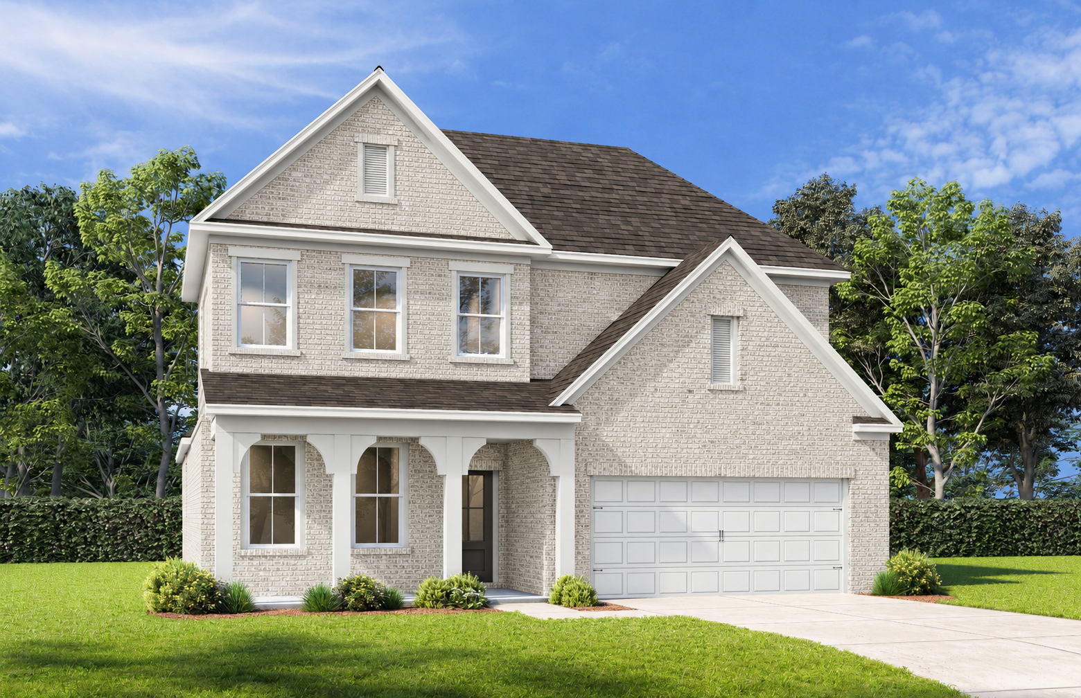 Craftsman-style exterior of The Ashport G featuring light brick, covered front porch, and a 2-car garage in Buford, GA.