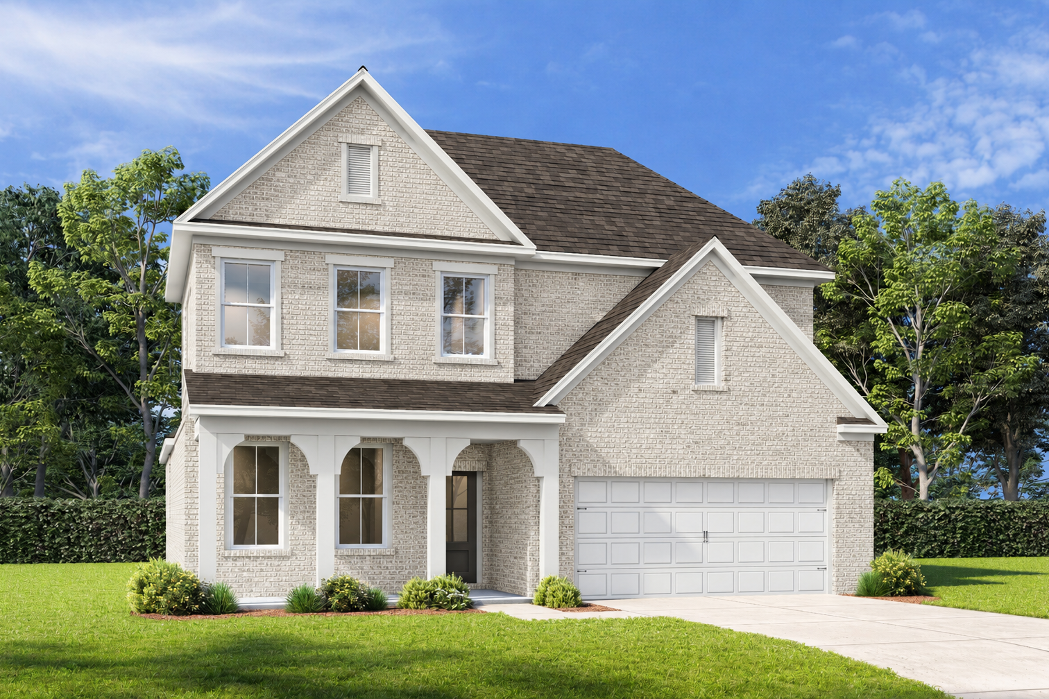 Craftsman-style exterior of The Ashport G featuring light brick, covered front porch, and a 2-car garage in Buford, GA.