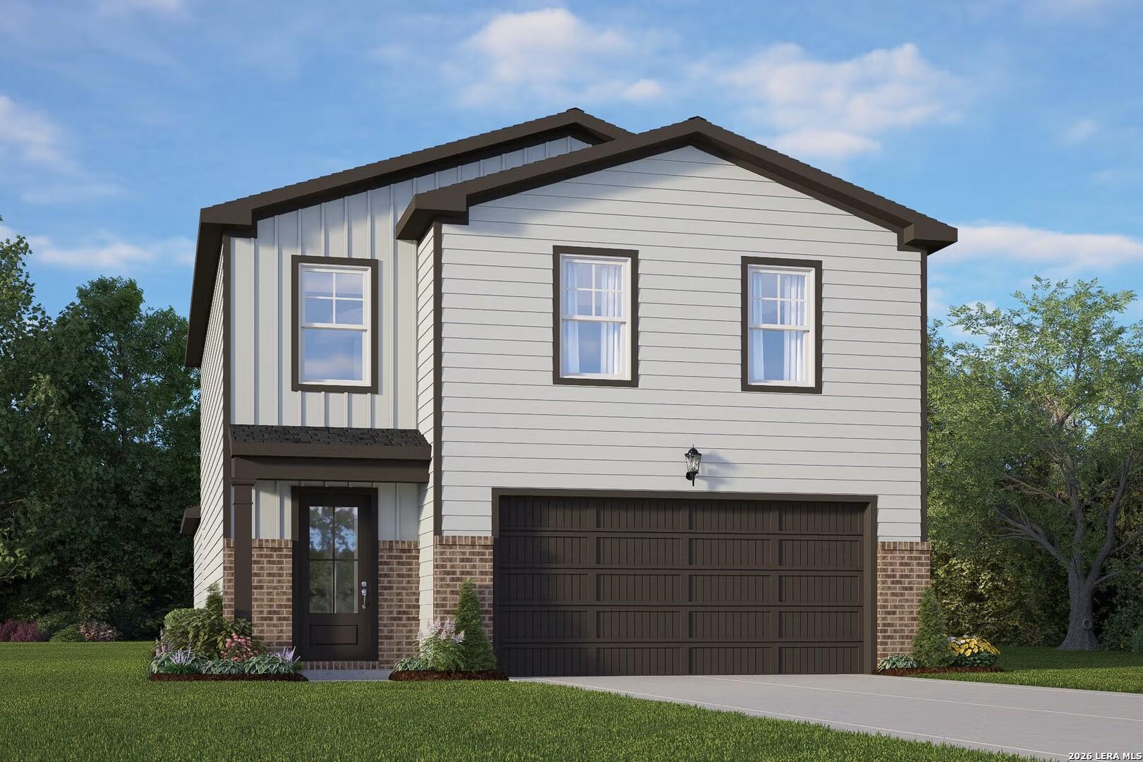 Modern two-story 5-bedroom home with 2-car garage, gray siding, brick accents, and lush landscaping in Applewhite Meadows, San Antonio, Texas - The Brazos B by Davidson Homes