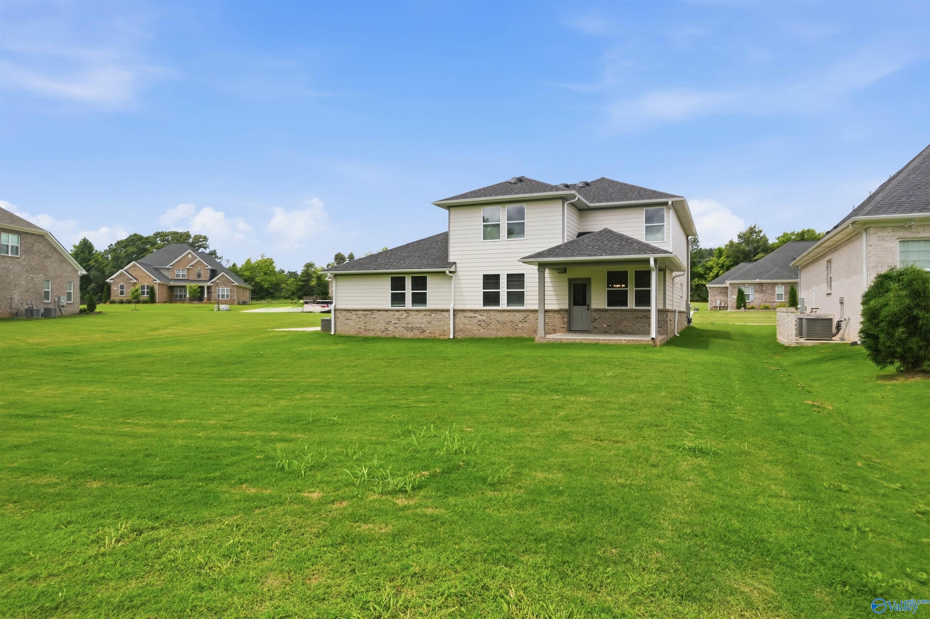 Two-story Dorado floor plan by Davidson Homes with a spacious backyard in Riverton Preserve, Huntsville, Alabama.