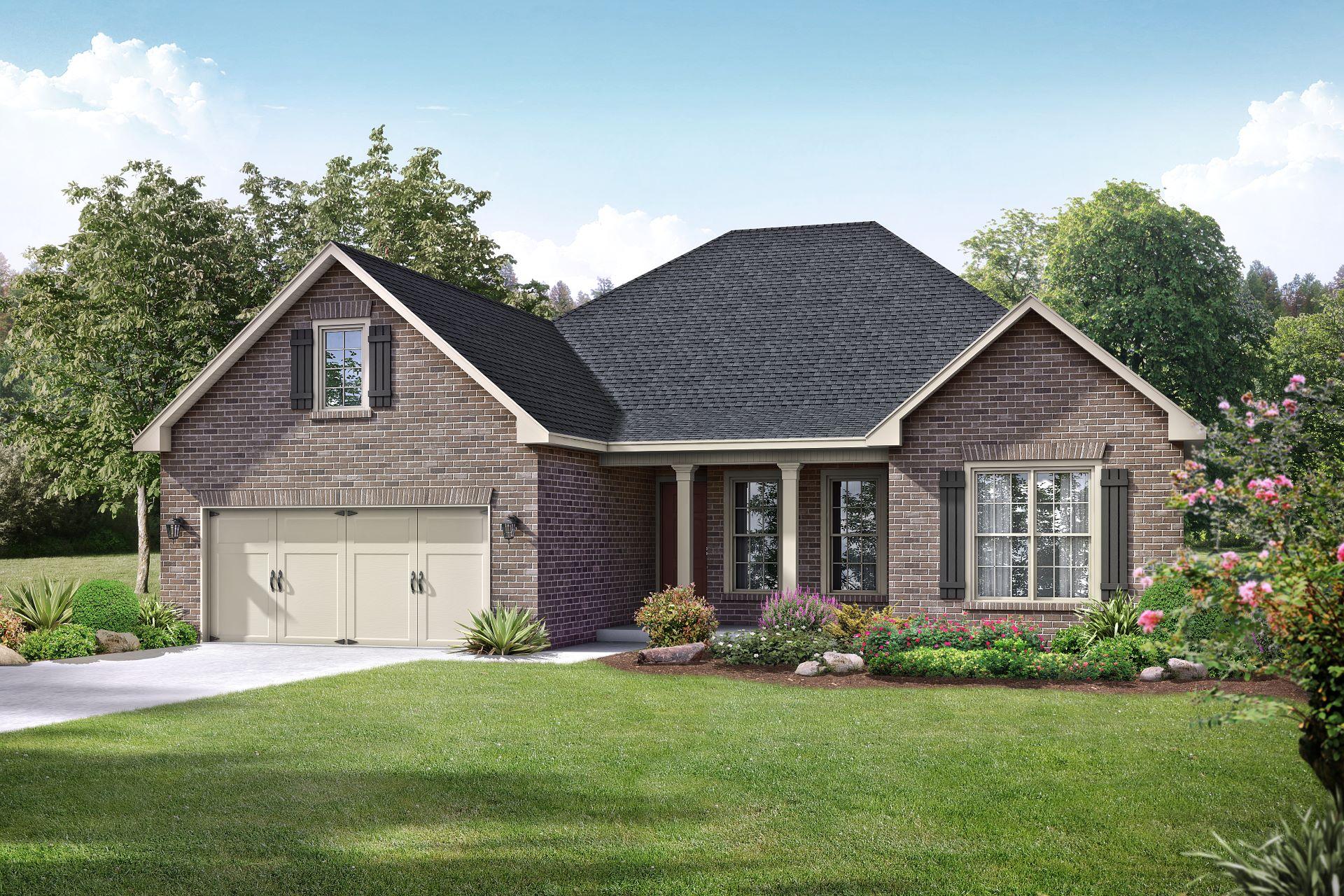 Charming brick exterior of The Rockford 1-story home by Davidson Homes, featuring two-car garage, gabled roof, and landscaped yard in Meridianville, AL