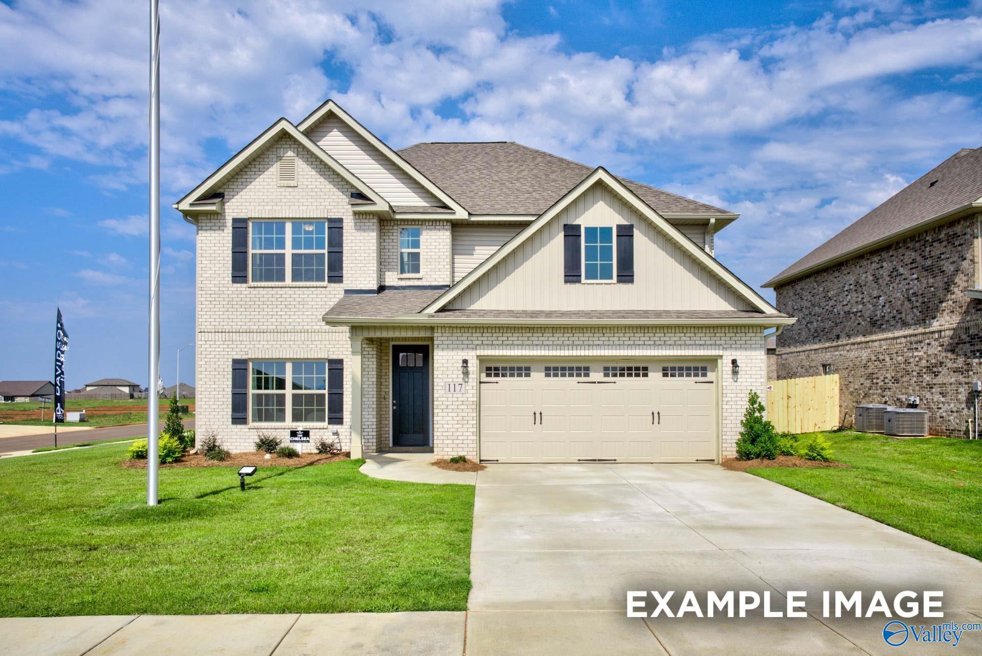 Two-story Chelsea A floor plan by Davidson Homes with brick exterior, 2-car garage, and lawn in Walker's Hill, Meridianville.