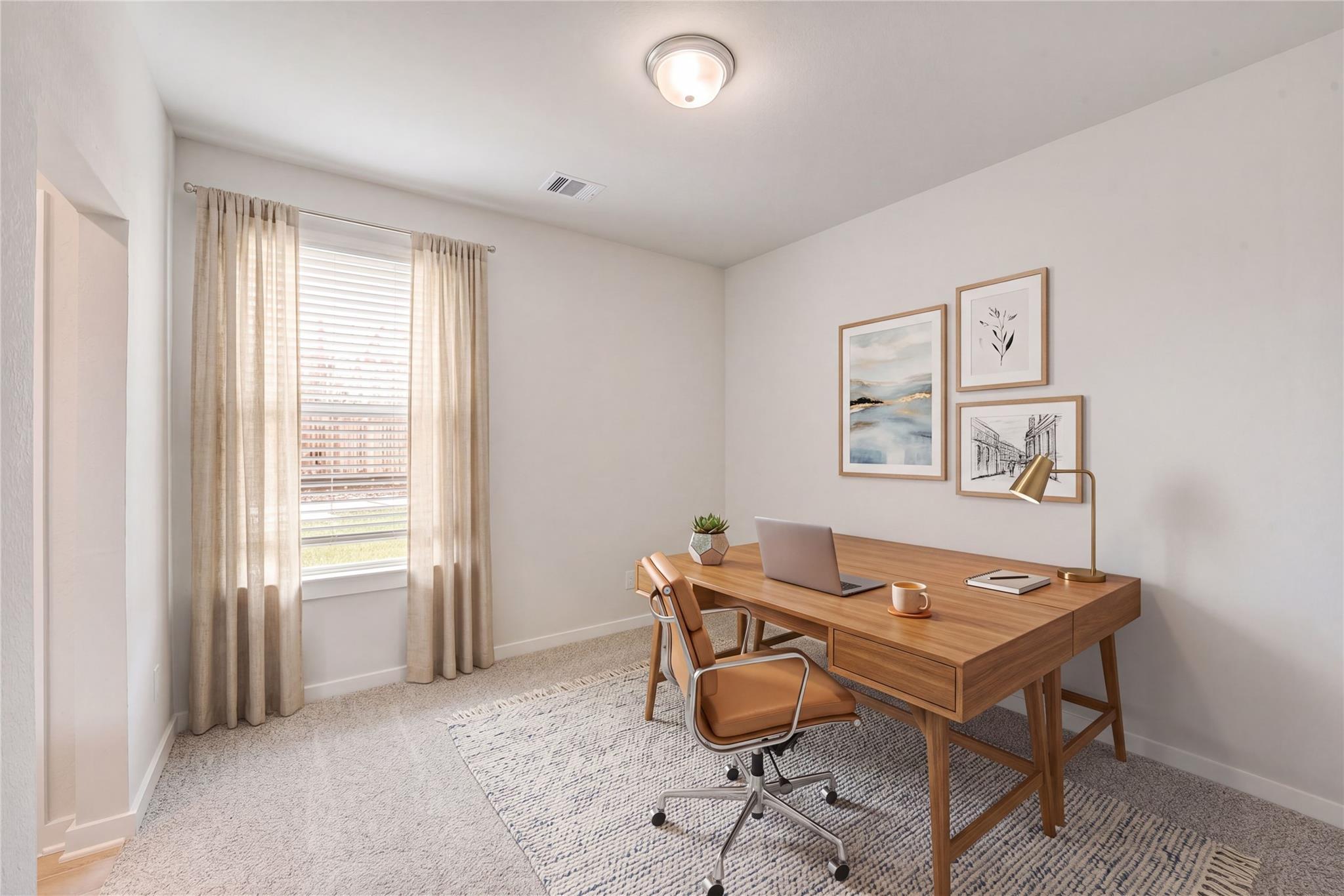 Modern home office with wooden desk, leather chair, laptop, succulent, and abstract wall art in Davidson Homes Acadia C, Magnolia TX