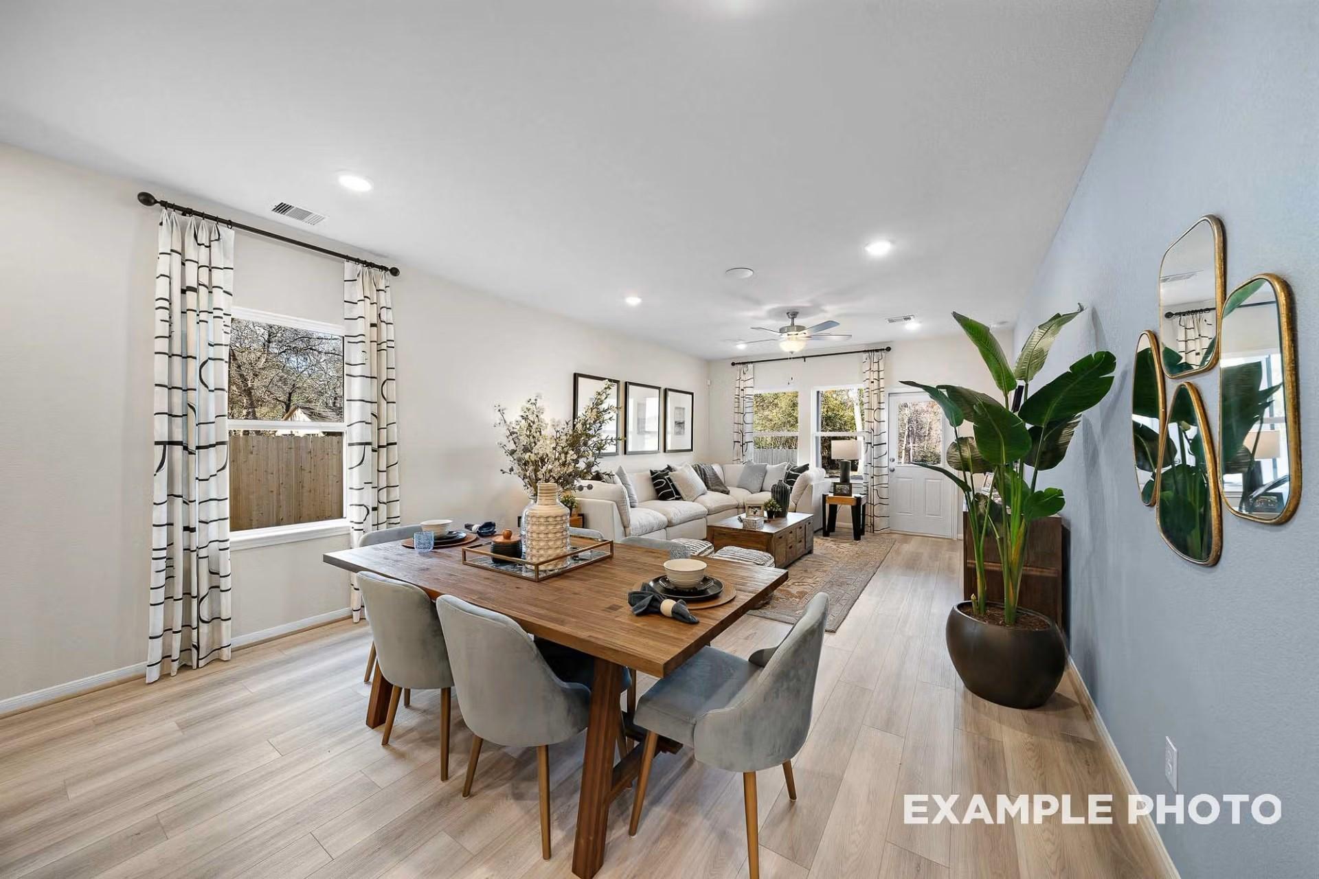 Open-concept dining and living area in The San Marcos E floor plan by Davidson Homes in Heartland, Texas.