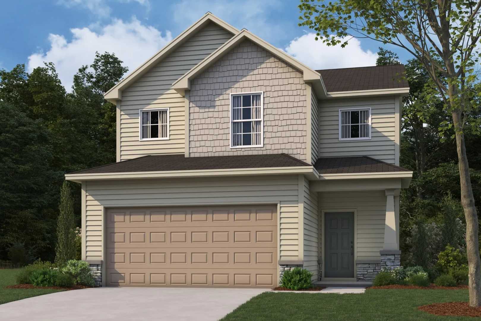 Two-story beige craftsman home exterior at Summer Vineyard in Phenix City Alabama with attached garage and lush landscaping