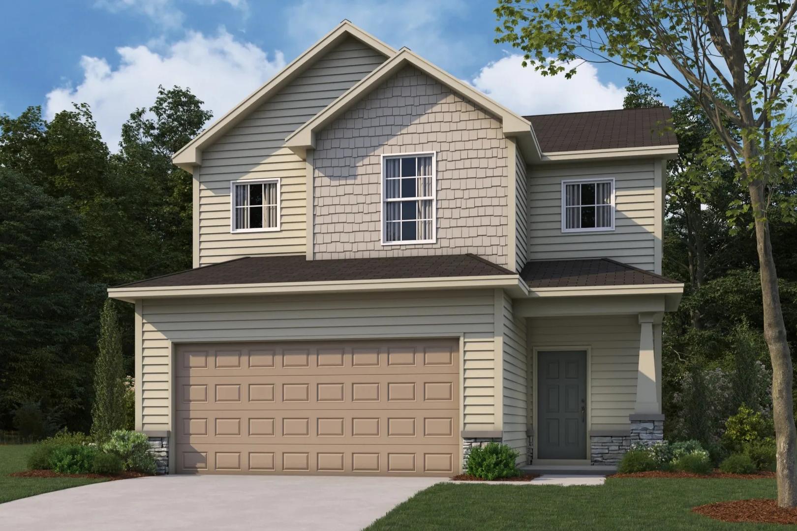 Two-story beige craftsman home exterior at Summer Vineyard in Phenix City Alabama with attached garage and lush landscaping