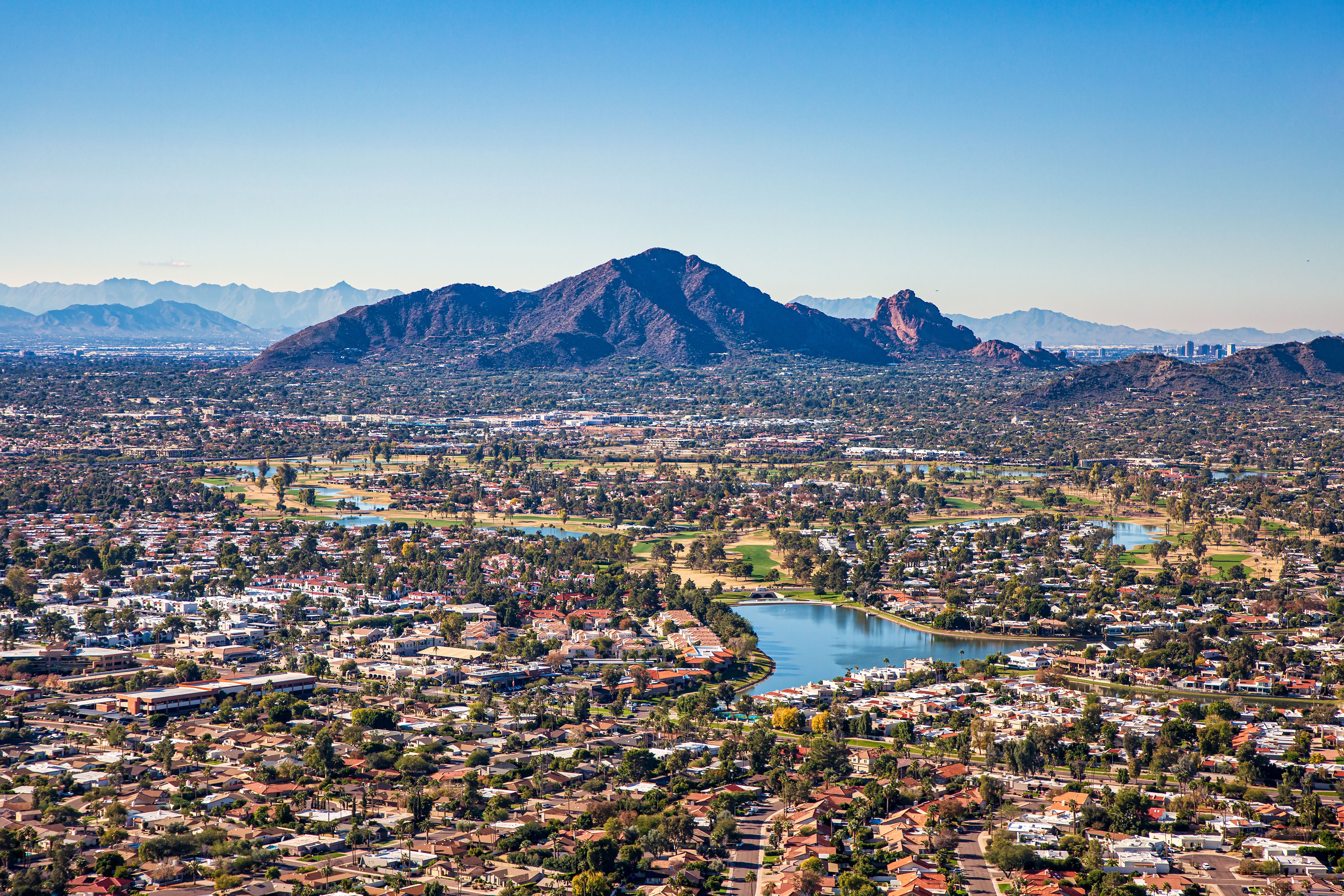 Aerial view of the Phoenix metro area showcasing desert landscapes, mountain views, residential neighborhoods, and outdoor lifestyle across Greater Phoenix, Arizona.