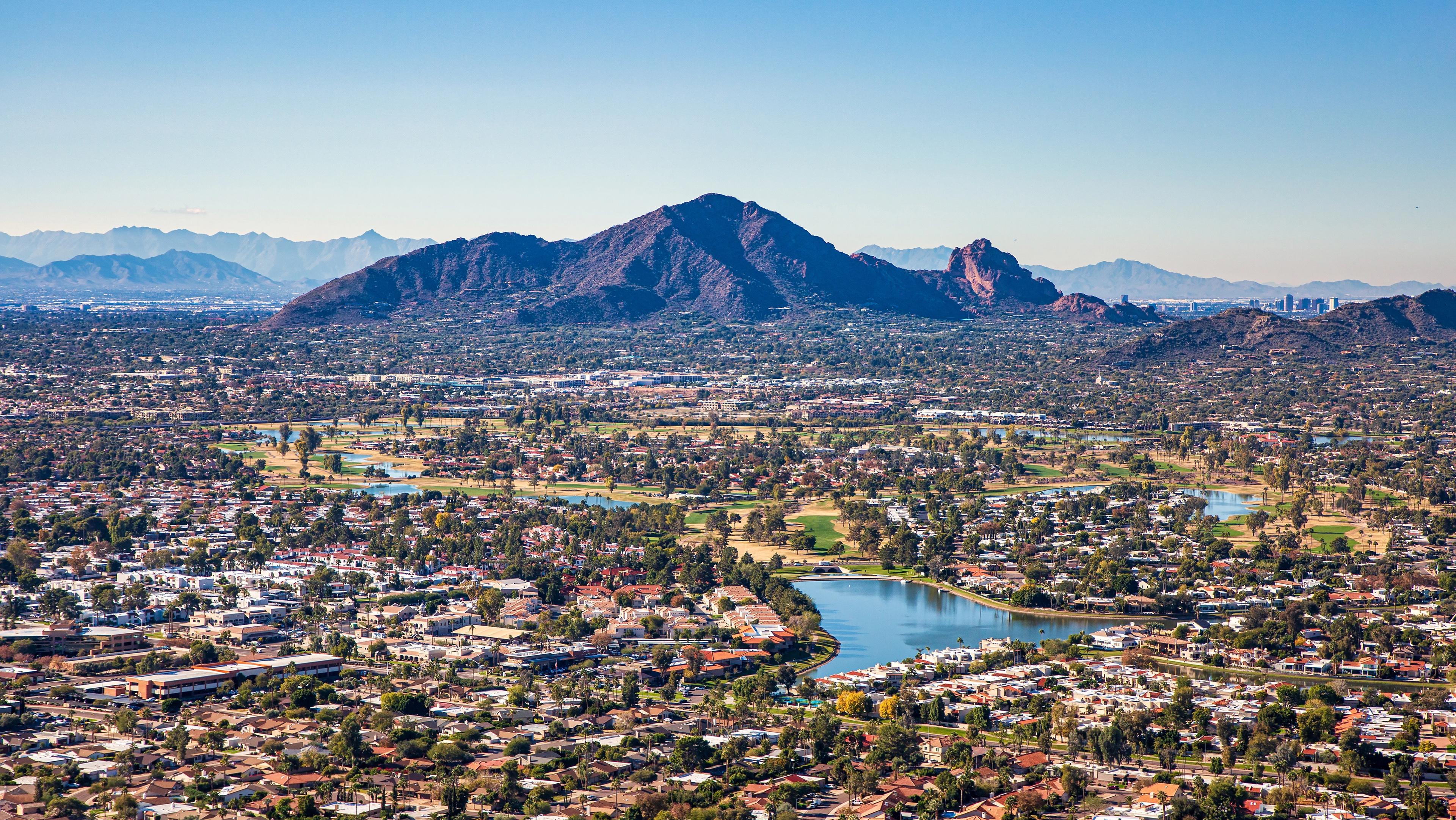 Aerial view of the Phoenix metro area showcasing desert landscapes, mountain views, residential neighborhoods, and outdoor lifestyle across Greater Phoenix, Arizona.
