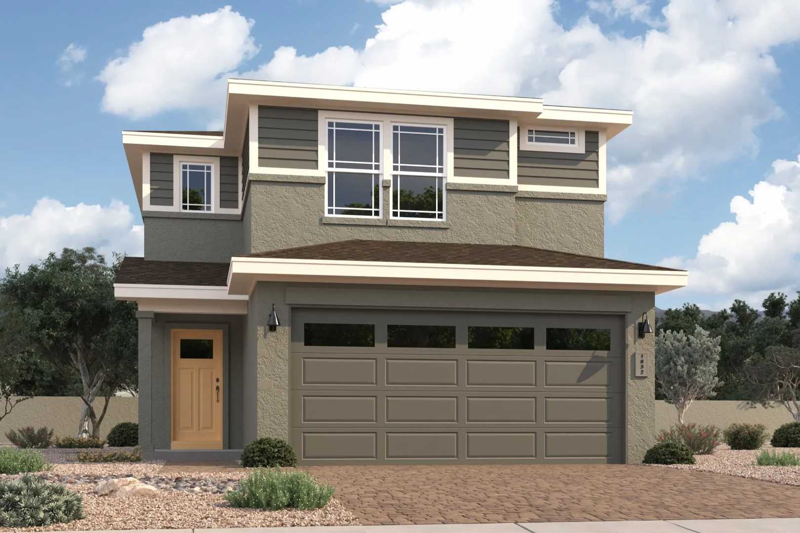 Contemporary two-story home exterior at South Ranch Southern Collection in Prescott AZ with gray siding, large windows, garage, and desert landscaping