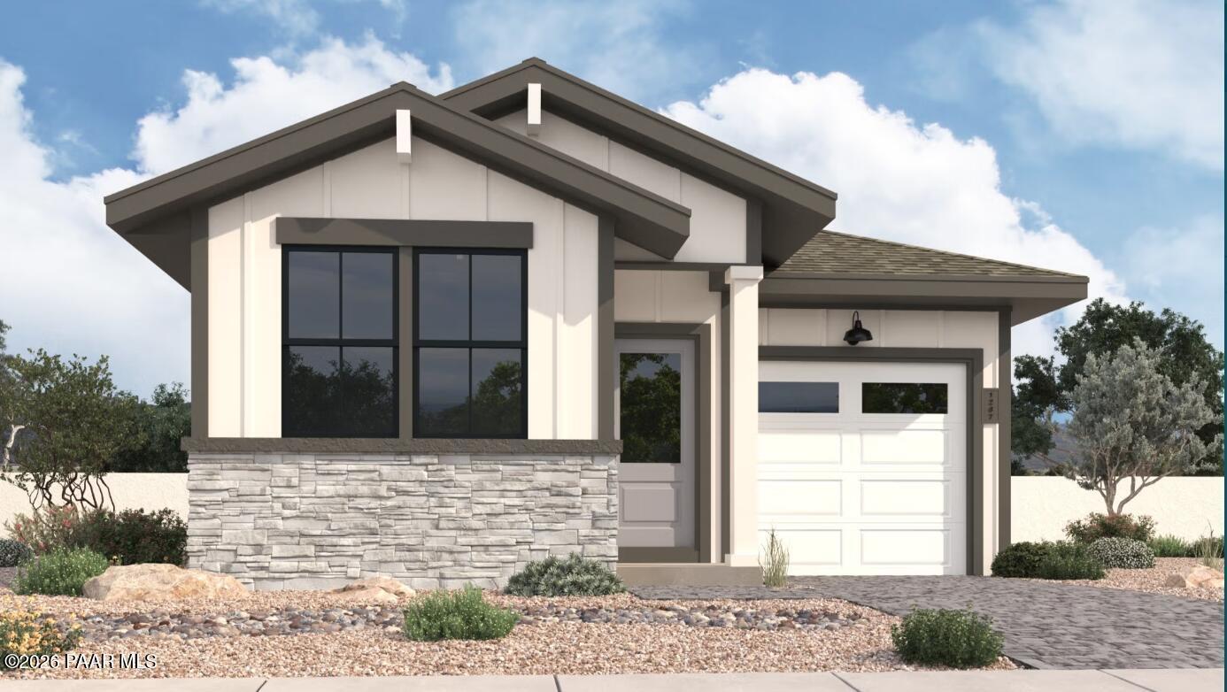 The Richmond B floor plan by Davidson Homes in South Ranch, Prescott, featuring stone accents and a 2-car garage.