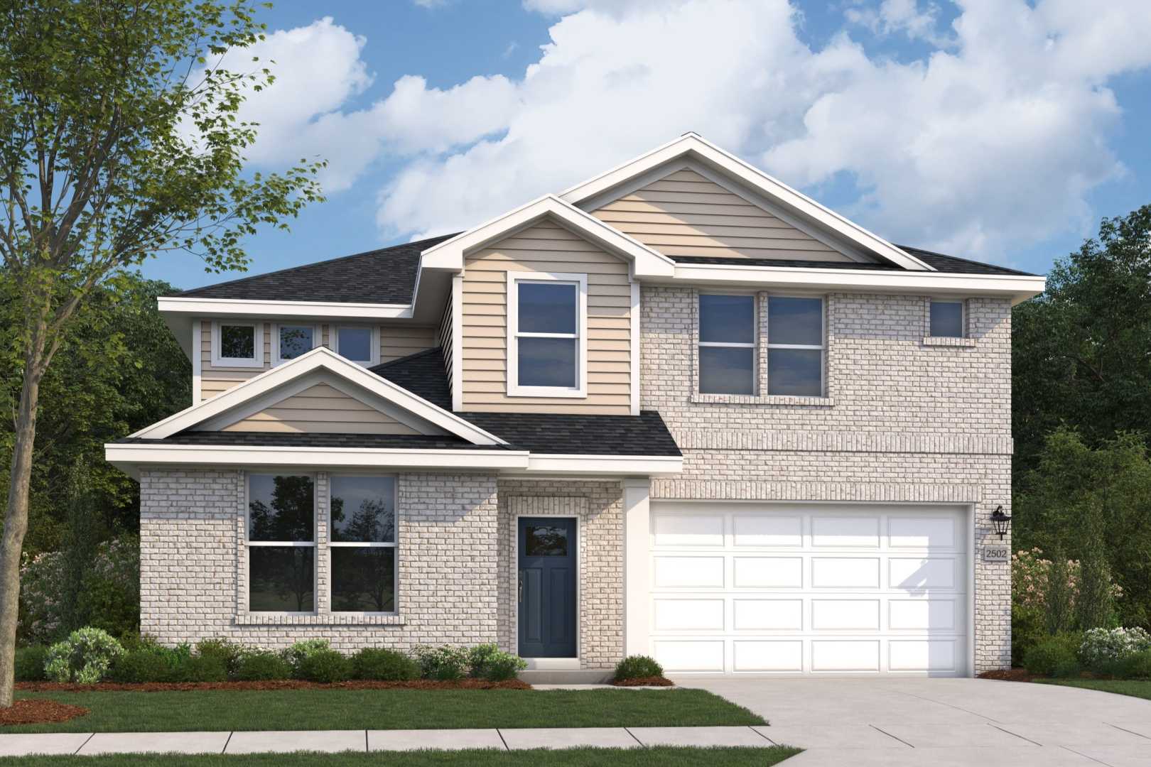 Two-story beige brick facade of The Radiance home by Evermore Homes in Perry, GA, with 2-car garage, gabled roof, and landscaped yard