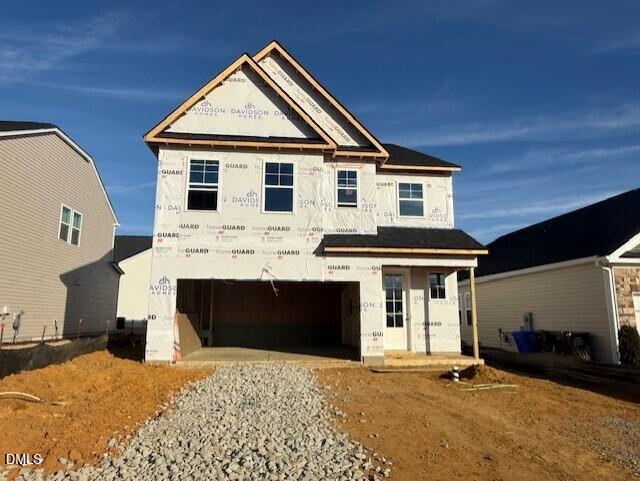 Two-story 3-bed 2.5-bath home exterior with 2-car garage in Gregory Village, Lillington NC by Davidson Homes The Gavin B