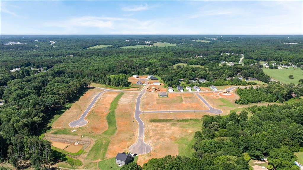 Aerial view of Cedar Farms community development in Winder, Georgia with new construction lots by Davidson Homes.