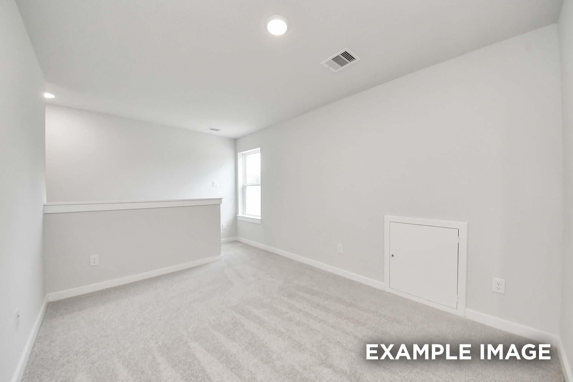 Bright upstairs bonus room with plush carpet and natural light in Davidson Homes The Blanco E, Windmill Estates, Magnolia, TX