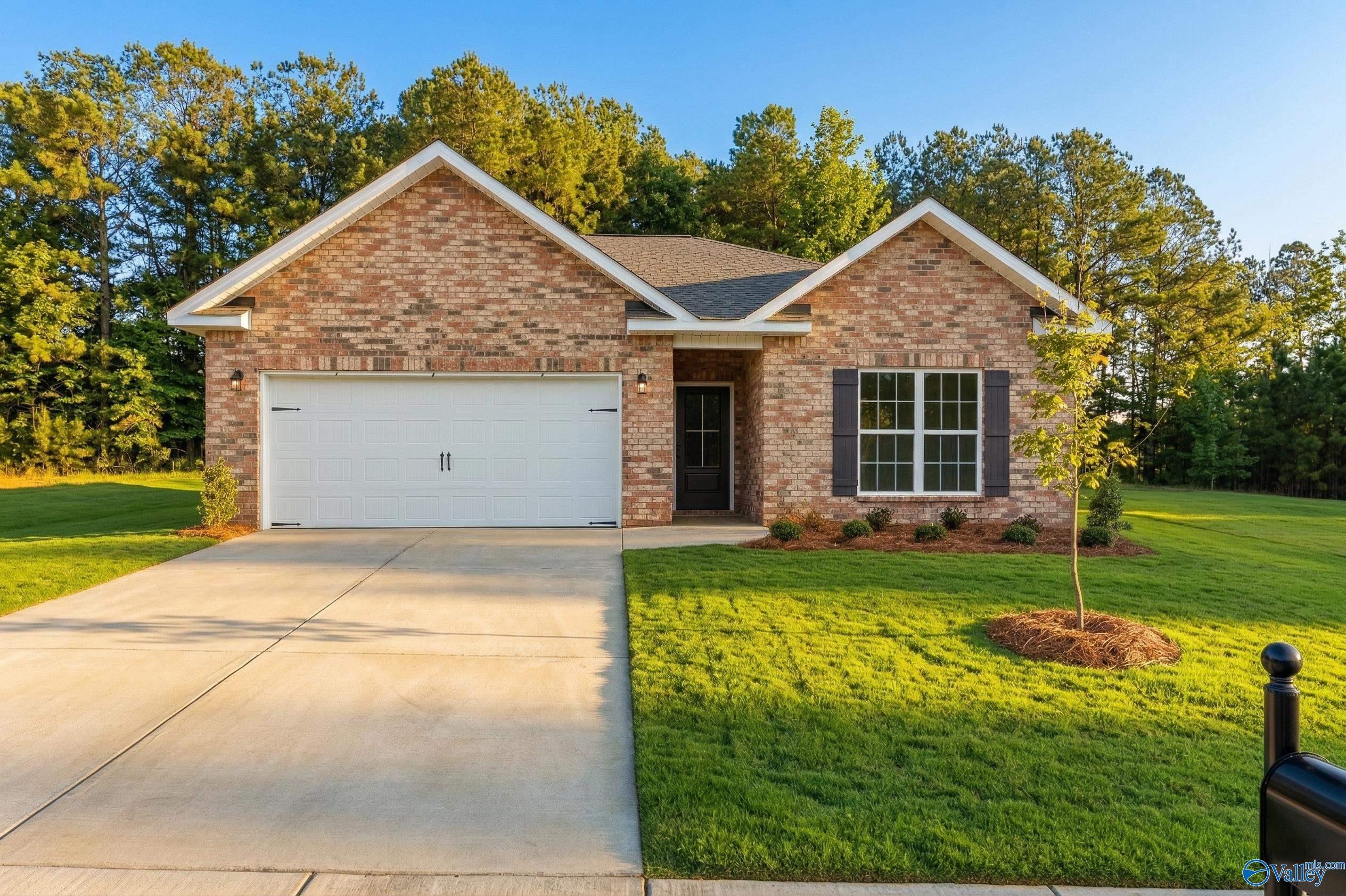 Single-story Asheville C floor plan by Davidson Homes with 2-car garage in The Highlands, Arab, Alabama.