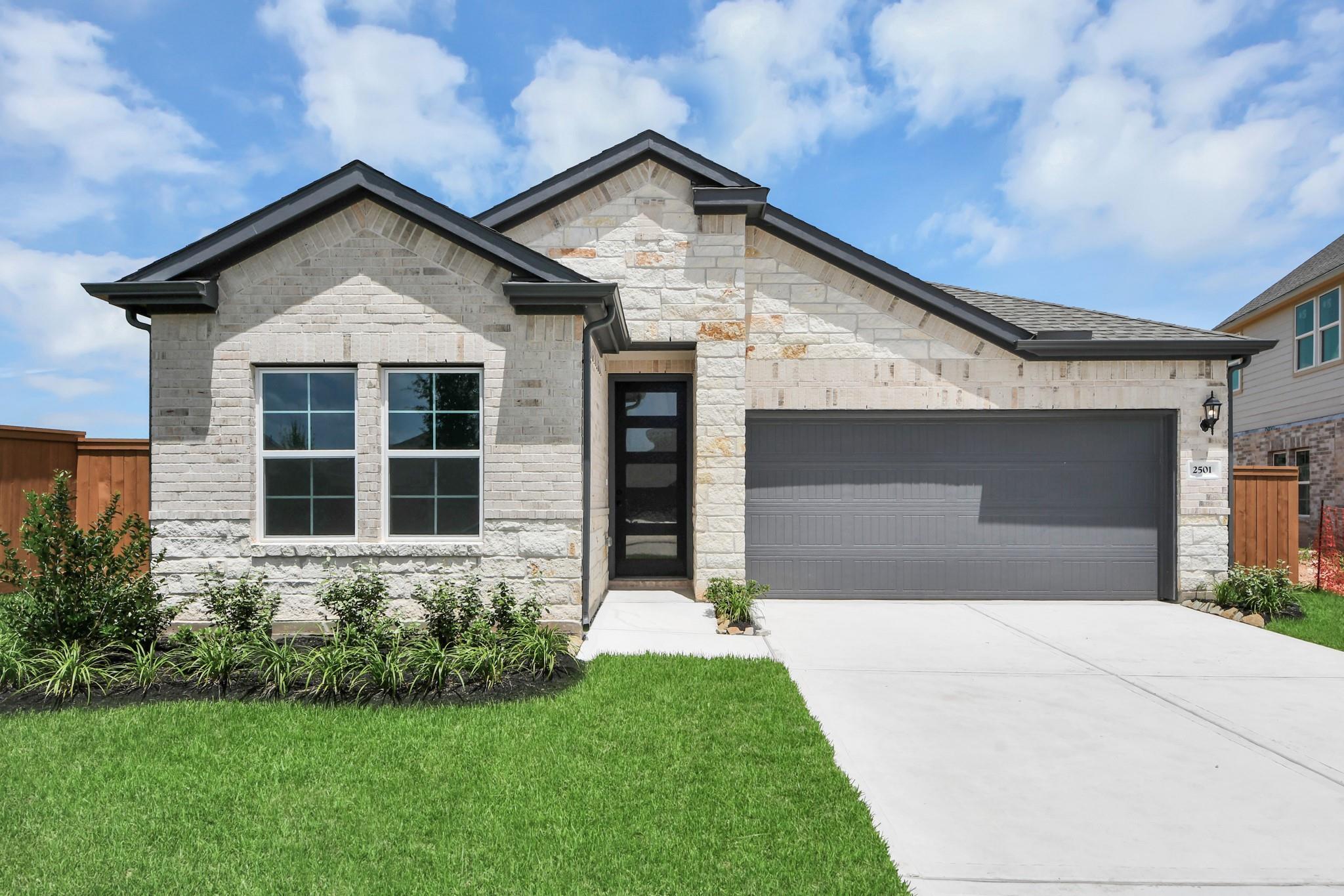 The Laguna C floor plan by Davidson Homes, a 1-story, 3-bedroom residence with a 2-car garage in Sunterra, Katy, Texas.
