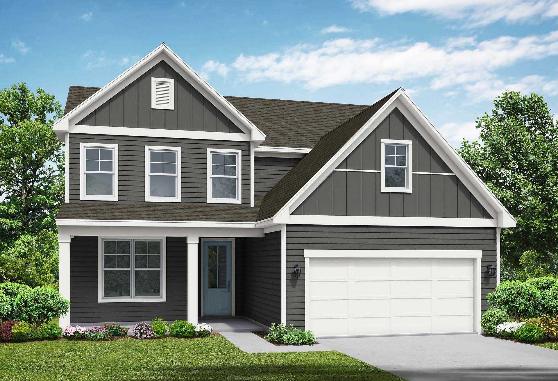 Two-story The Ash elevation featuring gray siding, gabled roof, two-car garage, front porch, and lush landscaping in Mt. Juliet