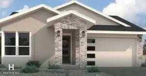 Modern single-story home with beige siding, brick entry, large windows, and 2-car garage in Prescott, Arizona - Davidson Homes The Boulder II H