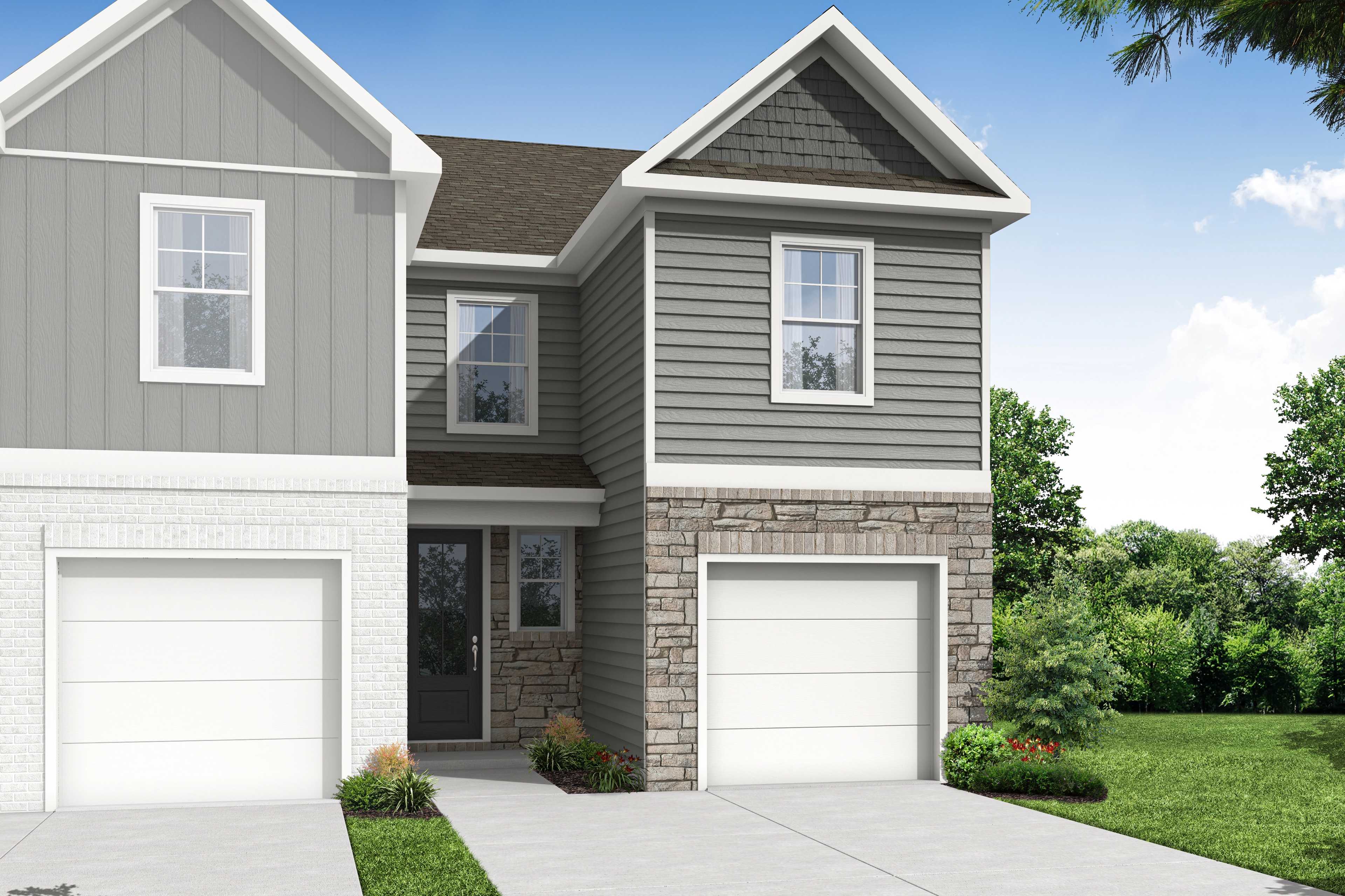 Wilmington B two-story multi-family duplex with gray siding, stone accents, one-car garages, and landscaped front yard