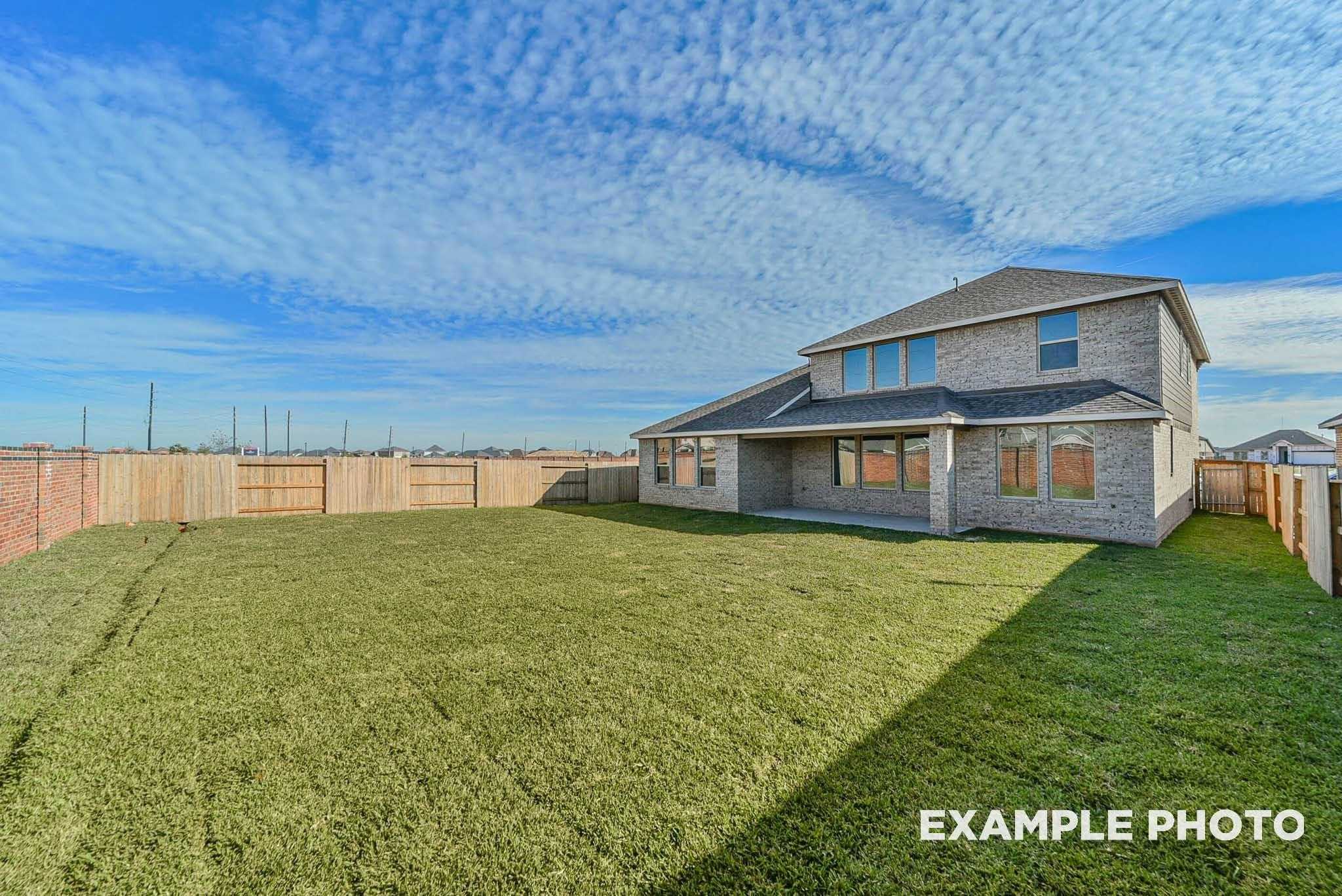 Brick 4-bedroom home with covered back patio and spacious fenced grassy yard in Sierra Vista, Rosharon, Texas - Davidson Homes Philip C