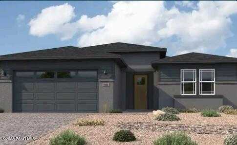 Modern single-story Durango II F home with 3-car garage, gray siding, desert landscaping in South Ranch, Prescott, Arizona