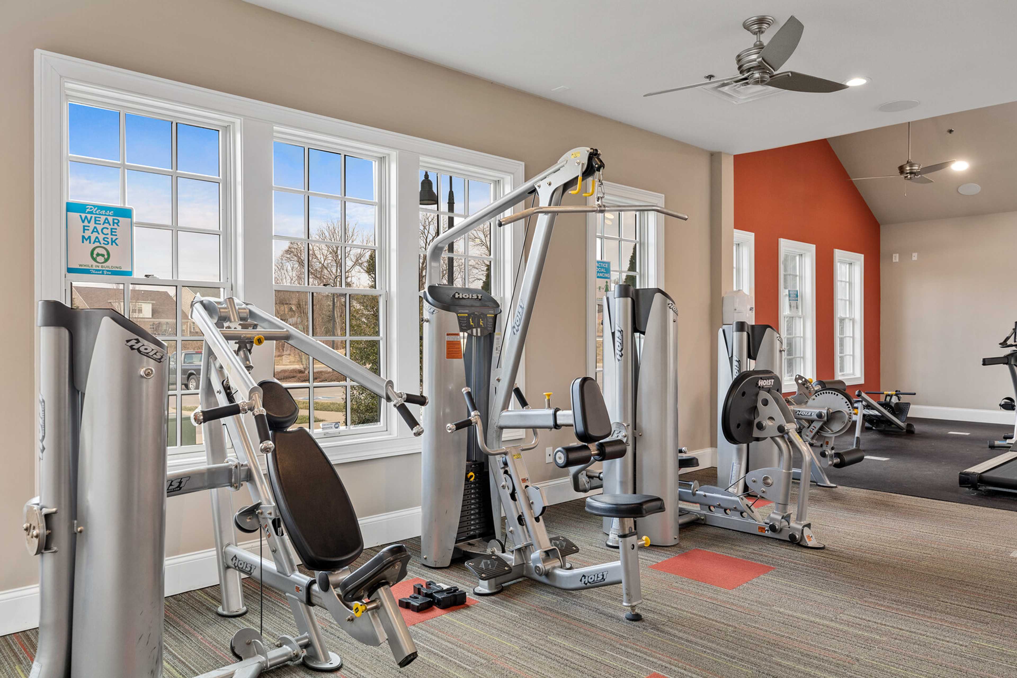 State-of-the-art fitness center at Carellton in Gallatin TN with weight machines, cardio equipment and large windows