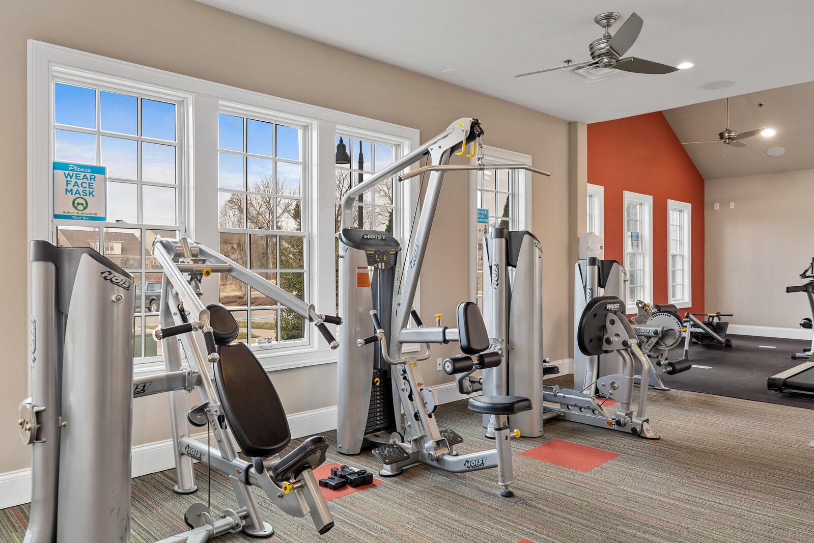State-of-the-art fitness center at Carellton in Gallatin TN with weight machines, cardio equipment and large windows