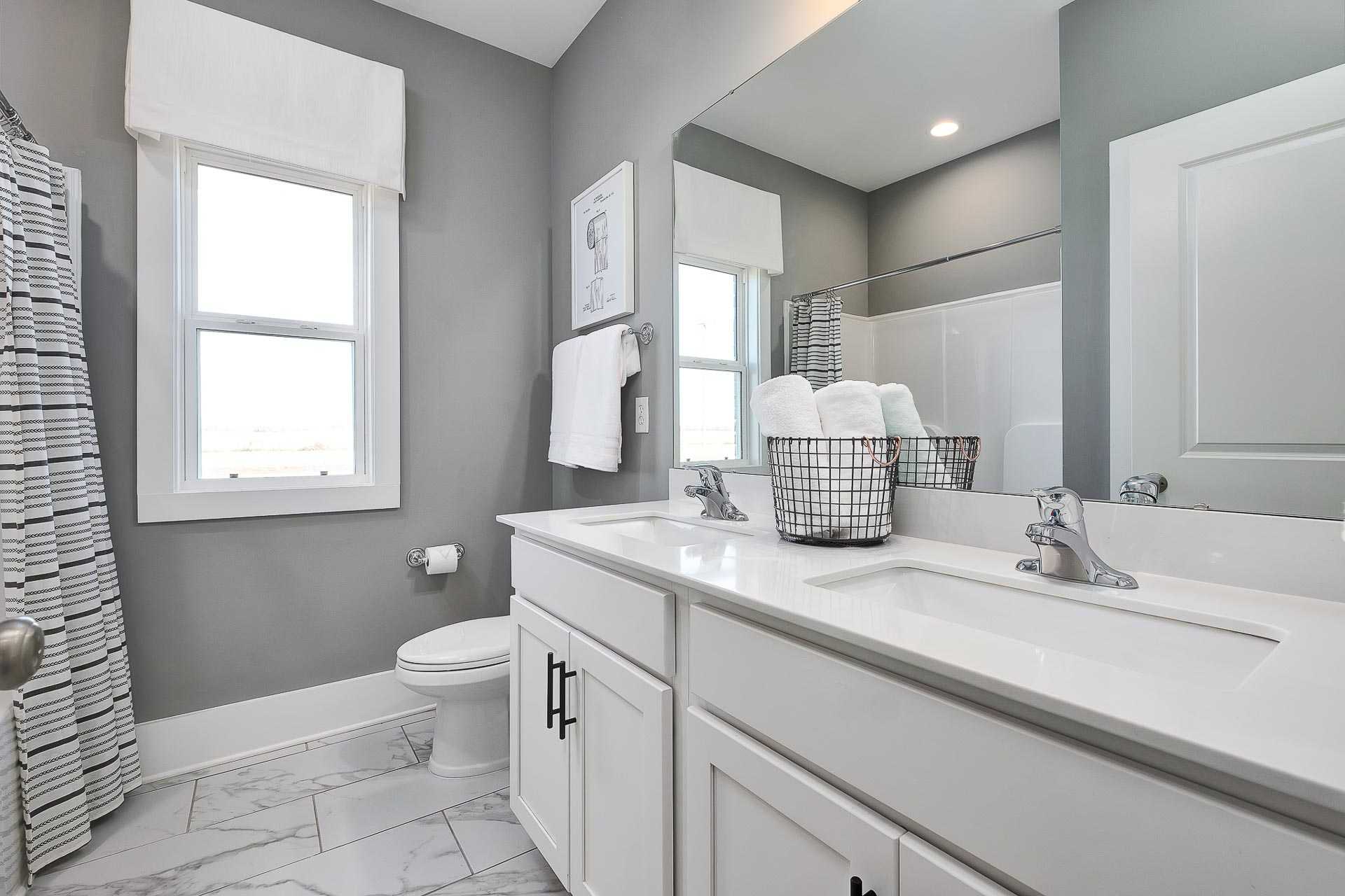 secondary bathroom with large window