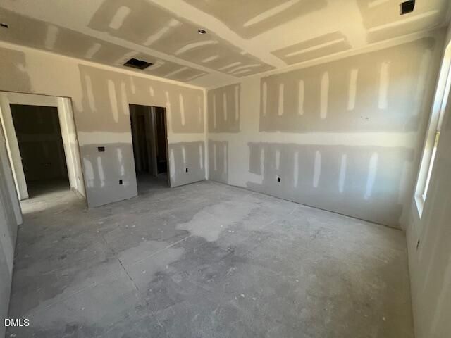 Unfinished drywall interior room under construction in Davidson Homes The Ash C floor plan, Lillington, North Carolina new home