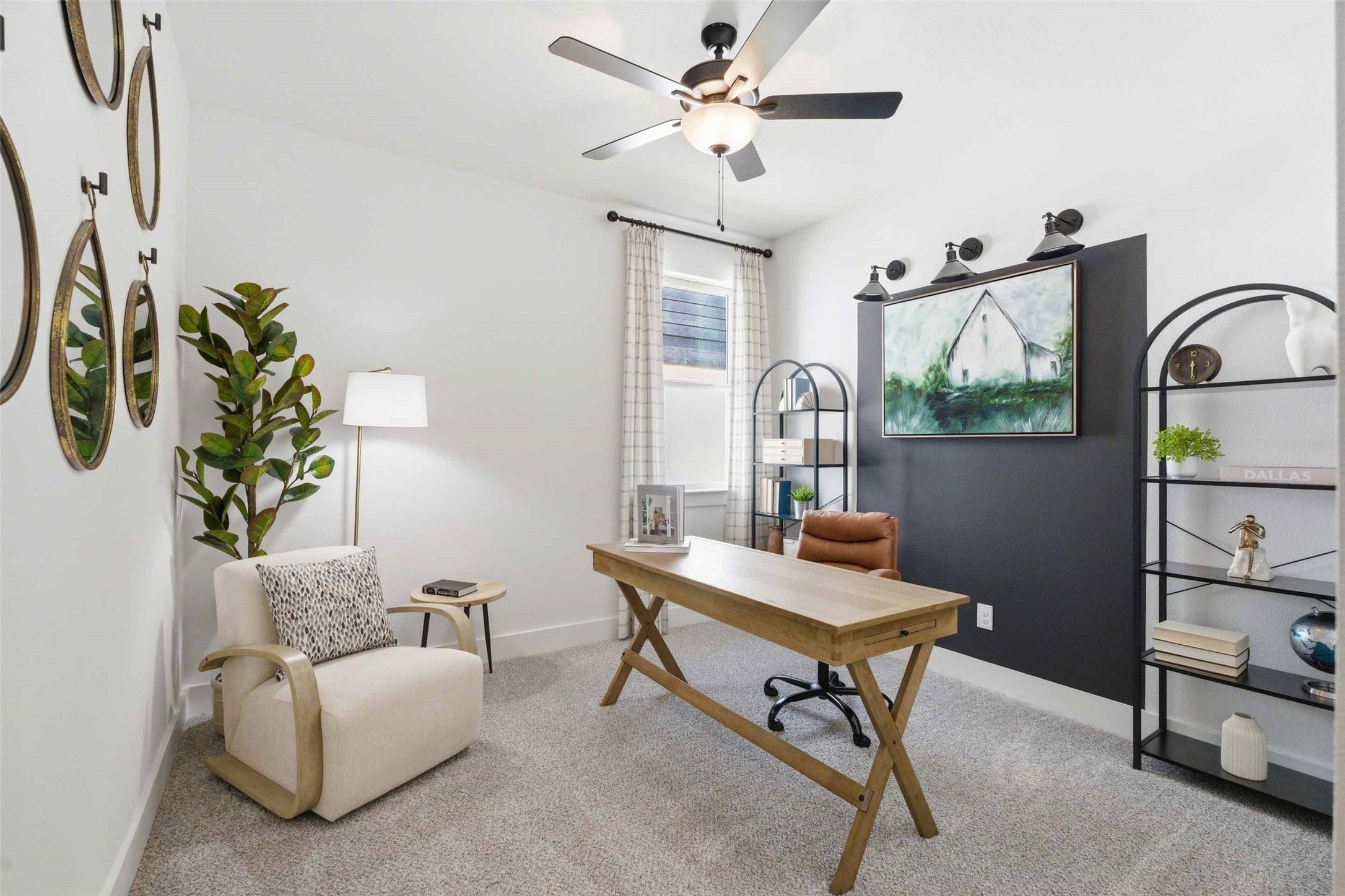 Modern home office with wood desk and accent wall in The Laurel N floor plan at Mercer Meadows, Royse City, Texas.