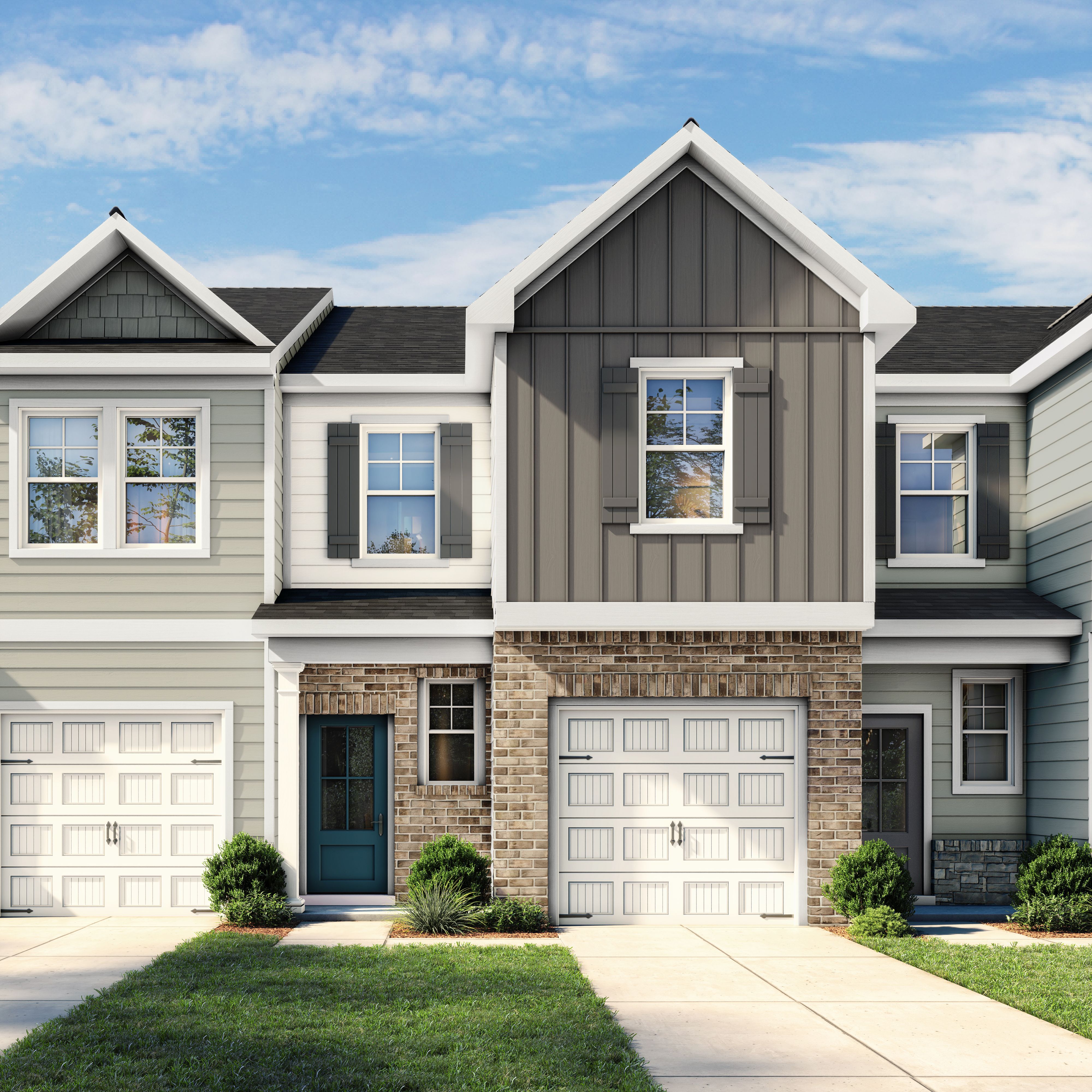 Modern exterior of The Wilmington II multi-family home featuring brick, siding, and a one-car garage in Lillington, NC.