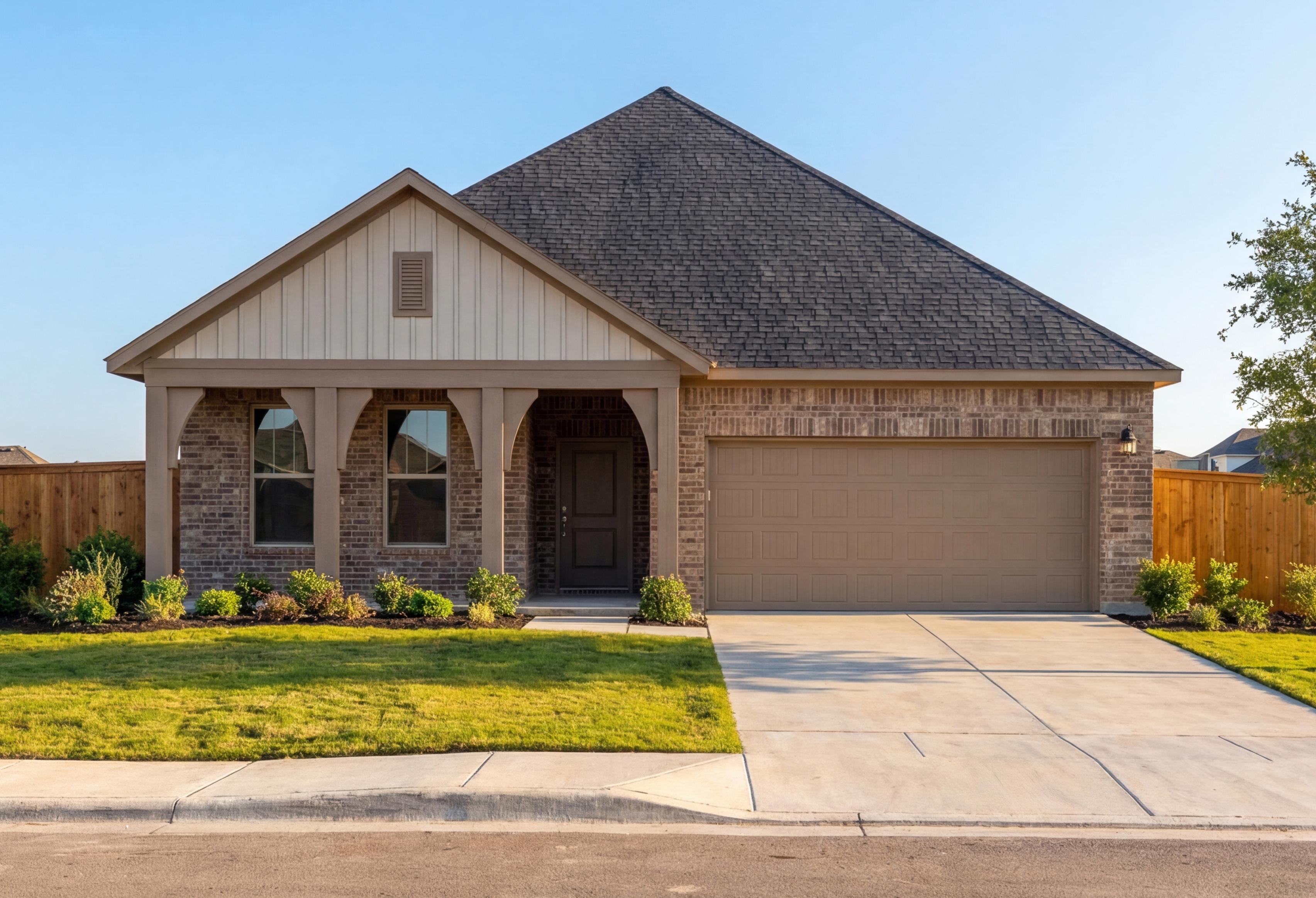 Modern single-story front elevation of The Laurel G showcasing brick and siding exterior, arched porch, 2-car garage, and landscaped yard
