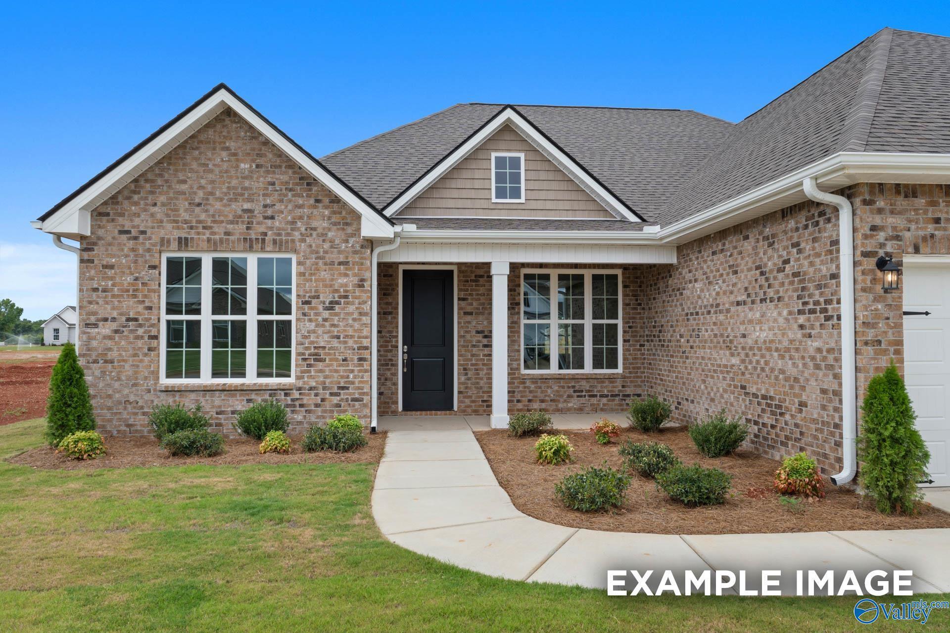 Brick exterior of The Finleigh floor plan by Davidson Homes in Briercreek, Meridianville, Alabama with 3-car garage.