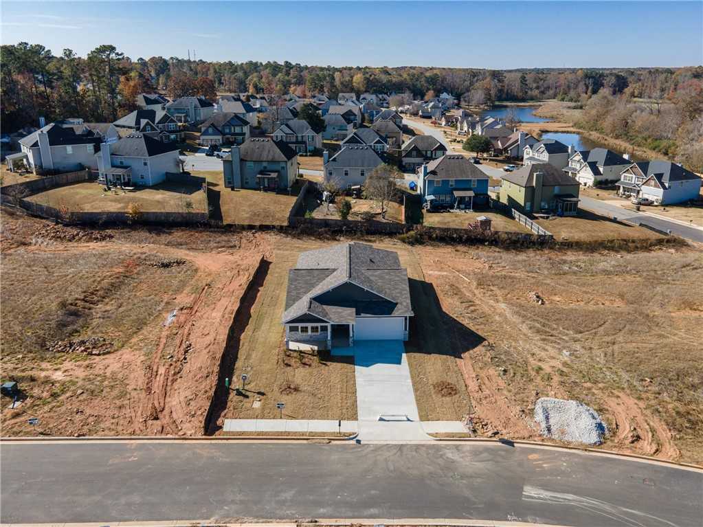 Aerial view of The Luna B 4-bedroom single-story home by Davidson Homes in Anderson Lakes, Opelika, Alabama, with 2-car garage and neighborhood surroundings