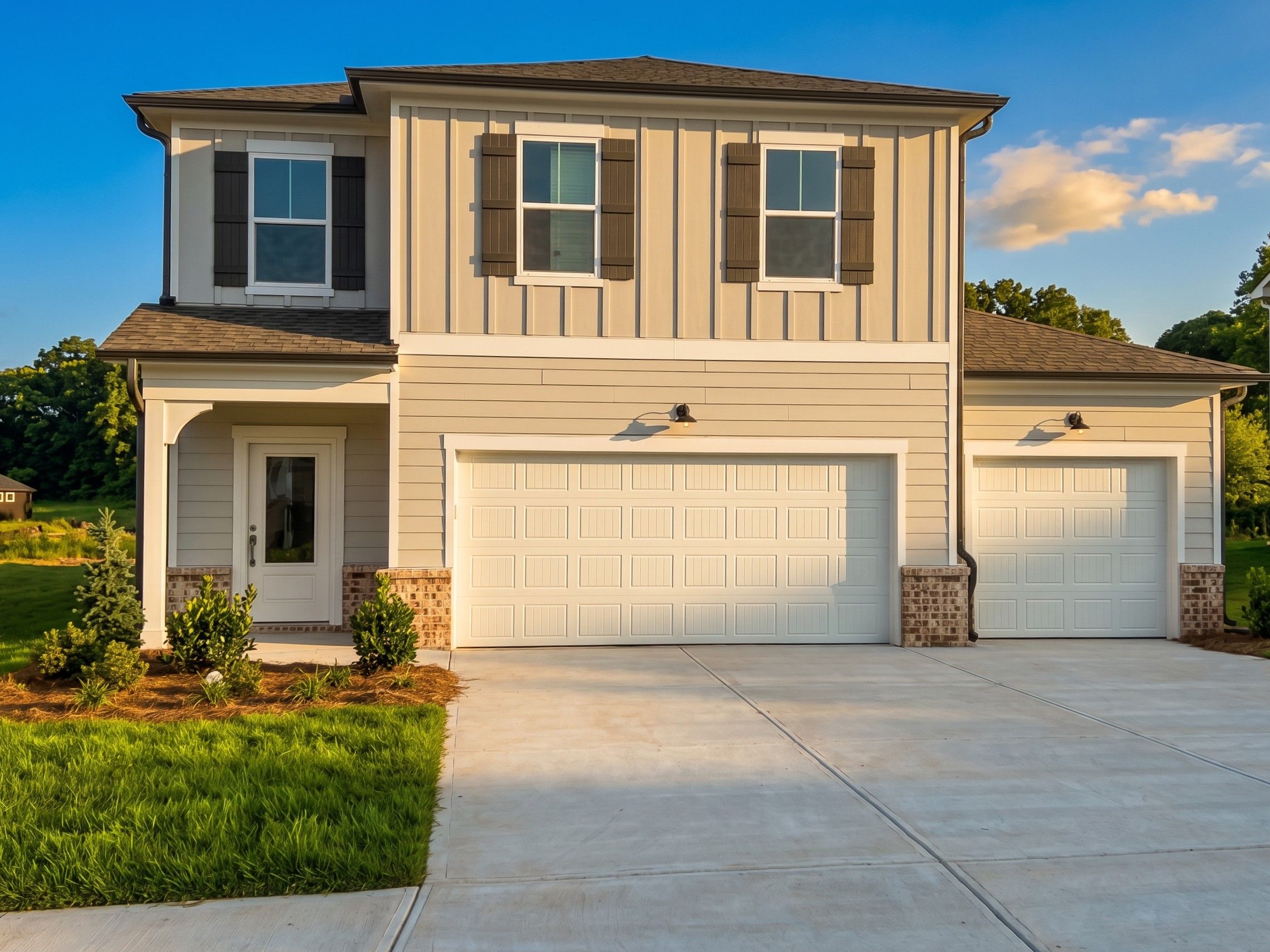Two-story Rabun A floor plan by Davidson Homes featuring 3-car garage in Cedar Farms, Winder, Georgia.