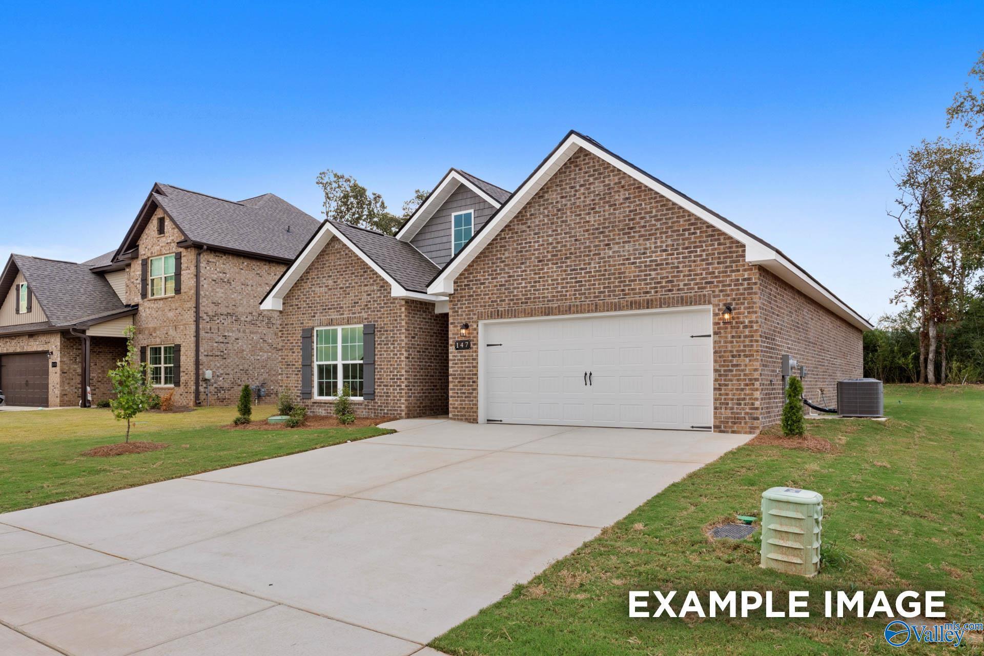1-story brick Franklin C floor plan by Davidson Homes with 2-car garage in Walker's Hill, Meridianville, Alabama.