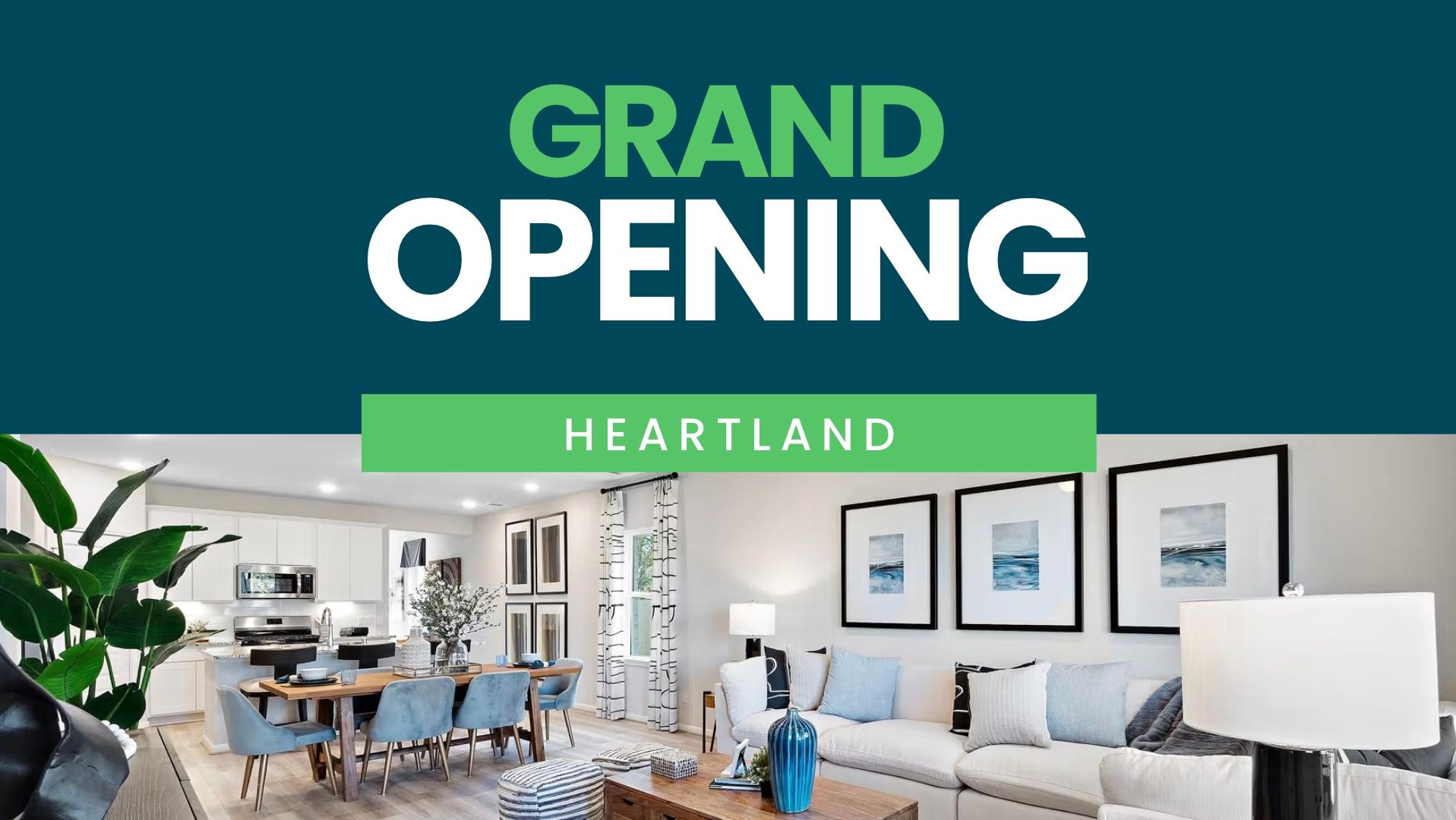 Grand opening Heartland banner showcasing modern open-concept kitchen and living room with plants, artwork, and stylish furniture