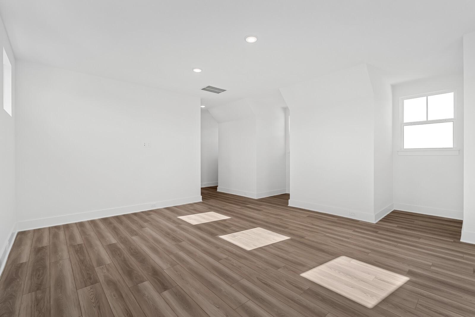 Spacious upstairs bonus room with sloped ceilings, hardwood floors, and large windows in Alston A home, Murfreesboro TN