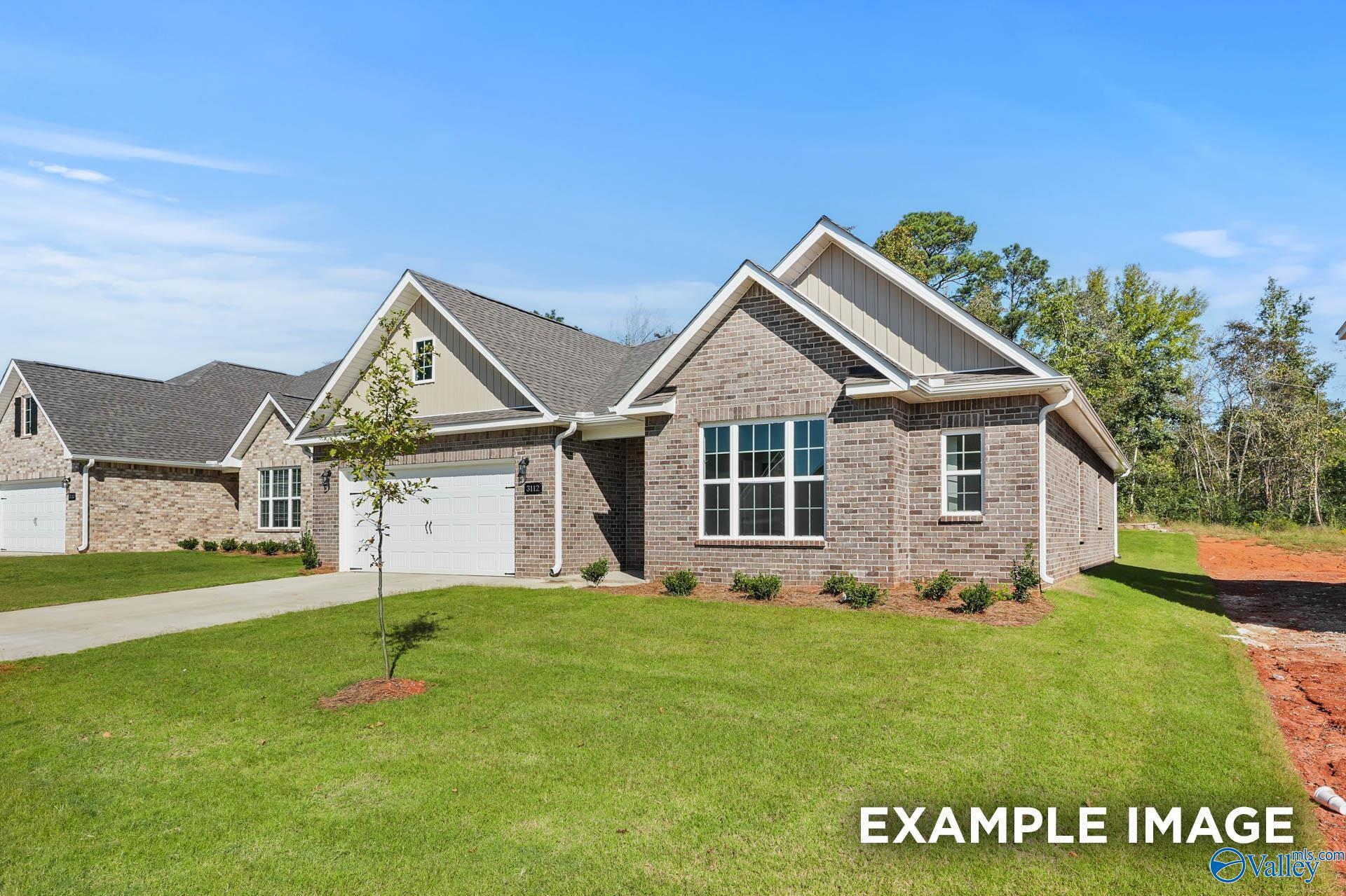 Single-story Montgomery D floor plan by Davidson Homes with brick exterior and 2-car garage in Anderson Farm, Athens, AL.