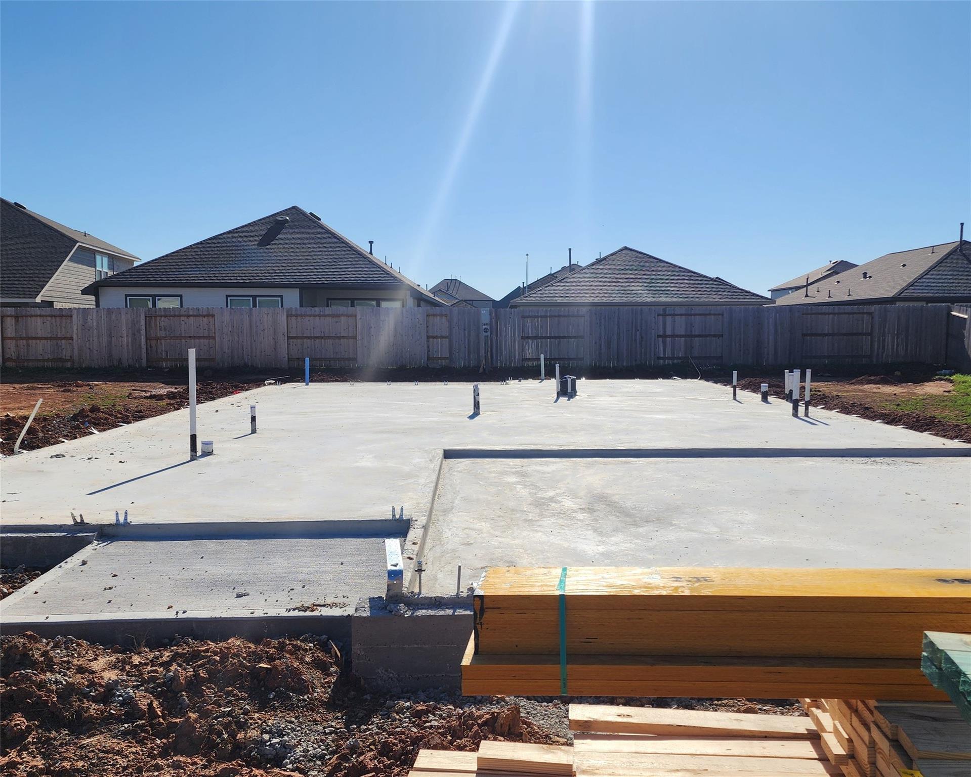 New home concrete foundation slab under construction, Davidson Homes Verano B in Sunterra, Katy, Texas