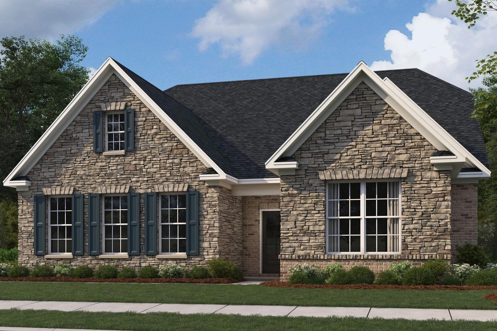 Stone exterior elevation of The Oxford 2-story home by Evermore Homes featuring gabled roof, shutters, and landscaped yard