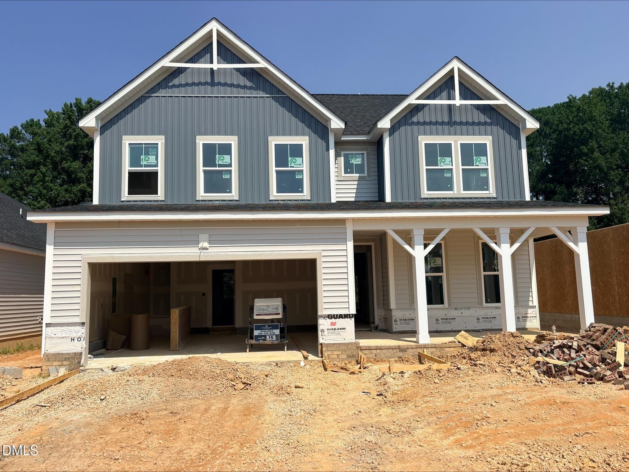 Two-story Willow B floor plan home under construction by Davidson Homes in Woodland Crossing, Zebulon, North Carolina.