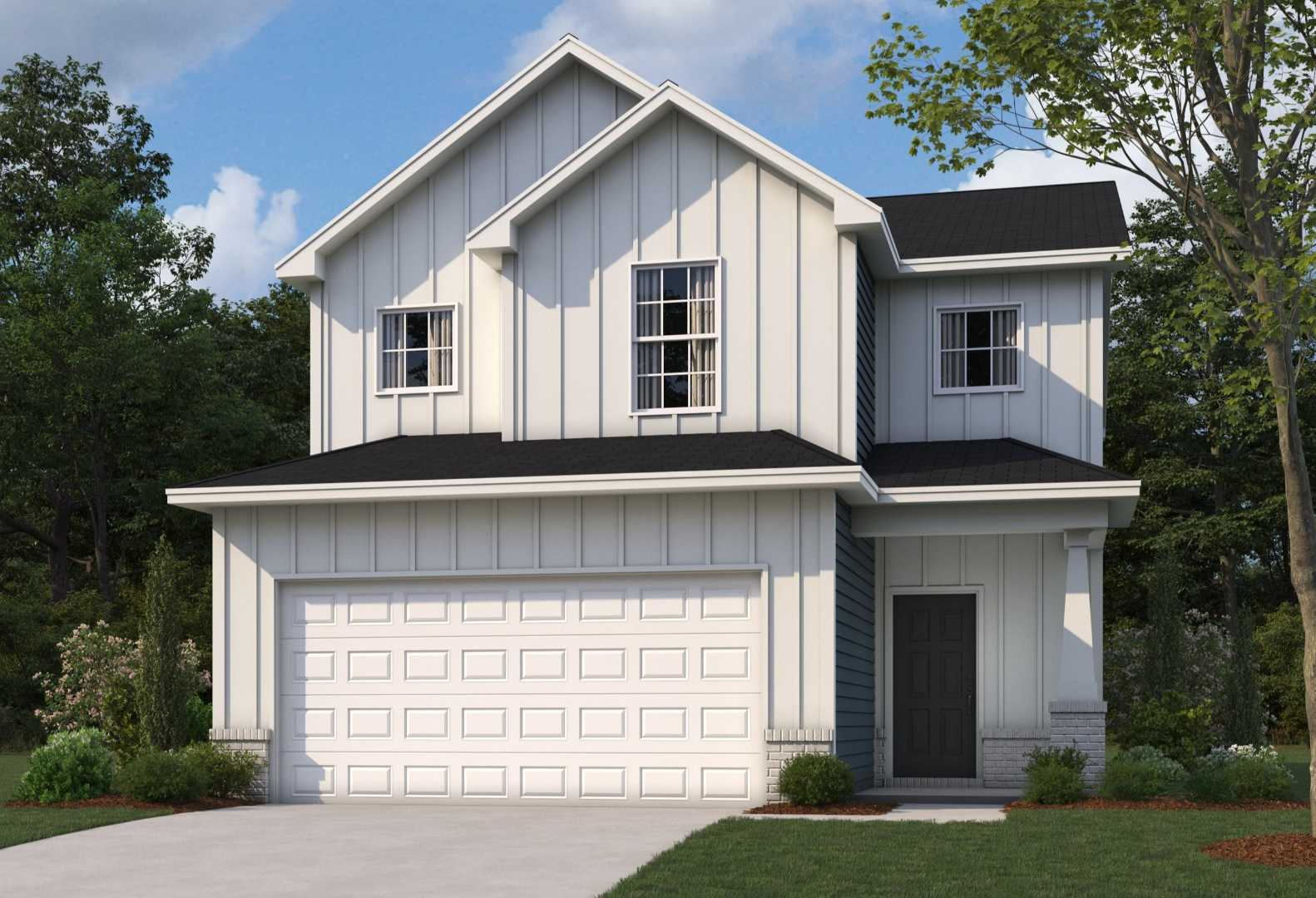 Modern two-story The Bartlett home elevation with white siding, black gabled roof, two-car garage, and lush landscaping
