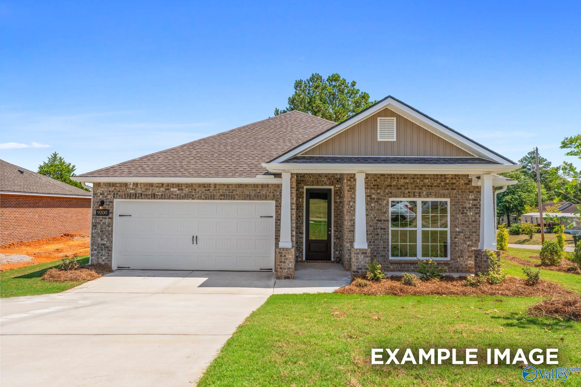 Single-story brick home with 2-car garage, The Daphne D floor plan by Davidson Homes in Spragins Cove, Huntsville, Alabama.