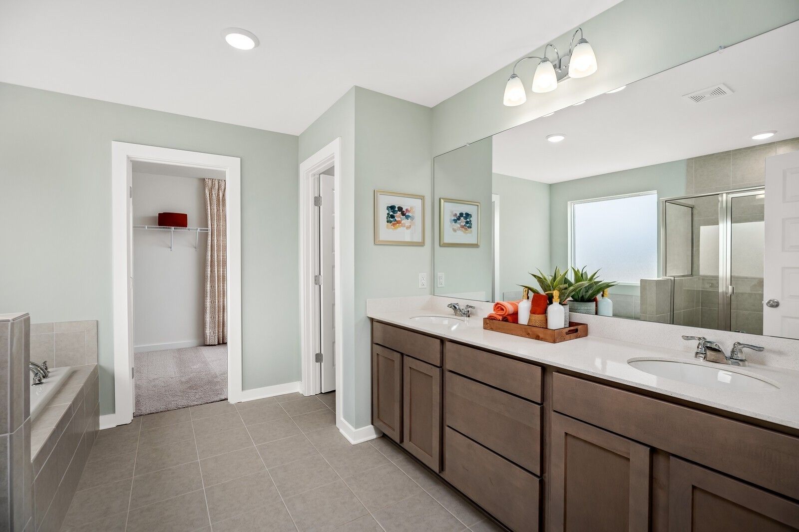 Elegant master bathroom with double vanity, soaking tub, walk-in shower in Davidson Homes The Gordon C, Sage Farms, White House, TN