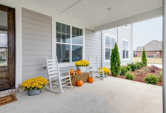 Davidson Homes The Hathaway Floor Plan Front Porch with rocking chairs and fall decor